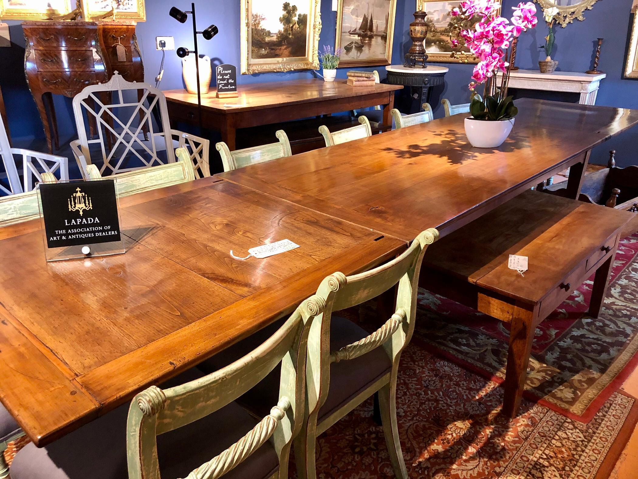 A good quality solid cherrywood French Provincial farmhouse double extending draw leaf table, sympathetically restored and re-polished. The cherry is of a very good color and is beautifully figured throughout. When the leaves are in the table is
