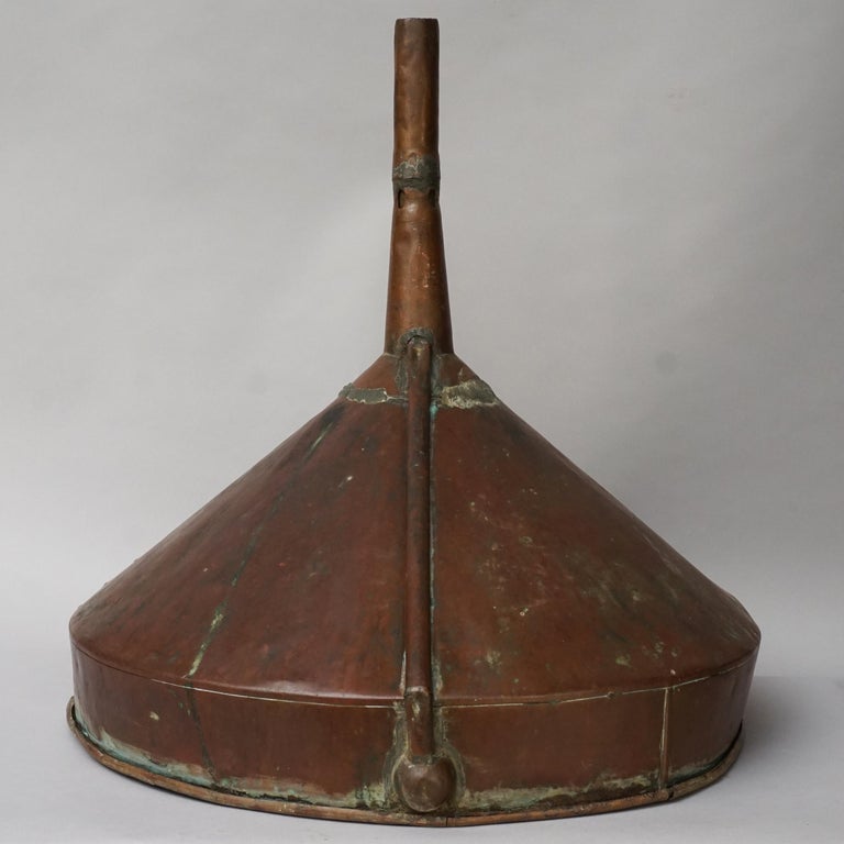 Very large decorative antique copper funnel used for decanting Champagne.
This object was made in Ay, Marne, France. One of the Grand-Cru Champagne regions in France.

Its size and patina has a real wow factor.

It is marked with a stamp:
Courtois,
