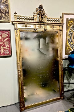 Large 19th Century French Gilt Mirror with Carved Putti