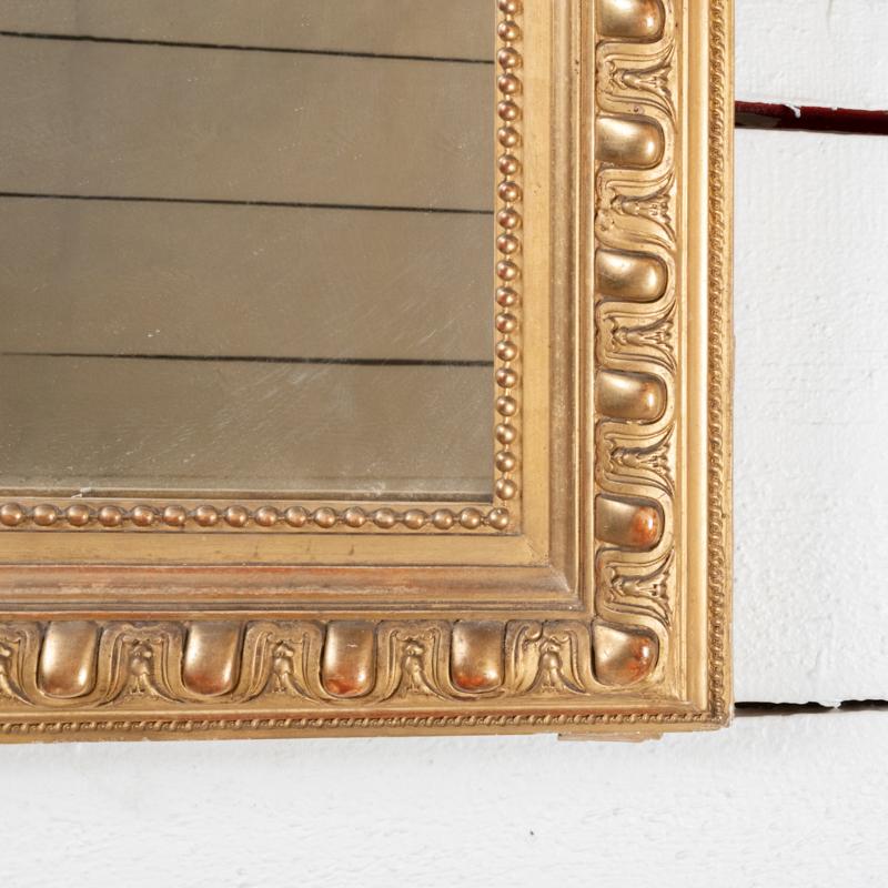 Gold Leaf Large 19th century French giltwood mirror H. 164 cm - L. 100 cm For Sale