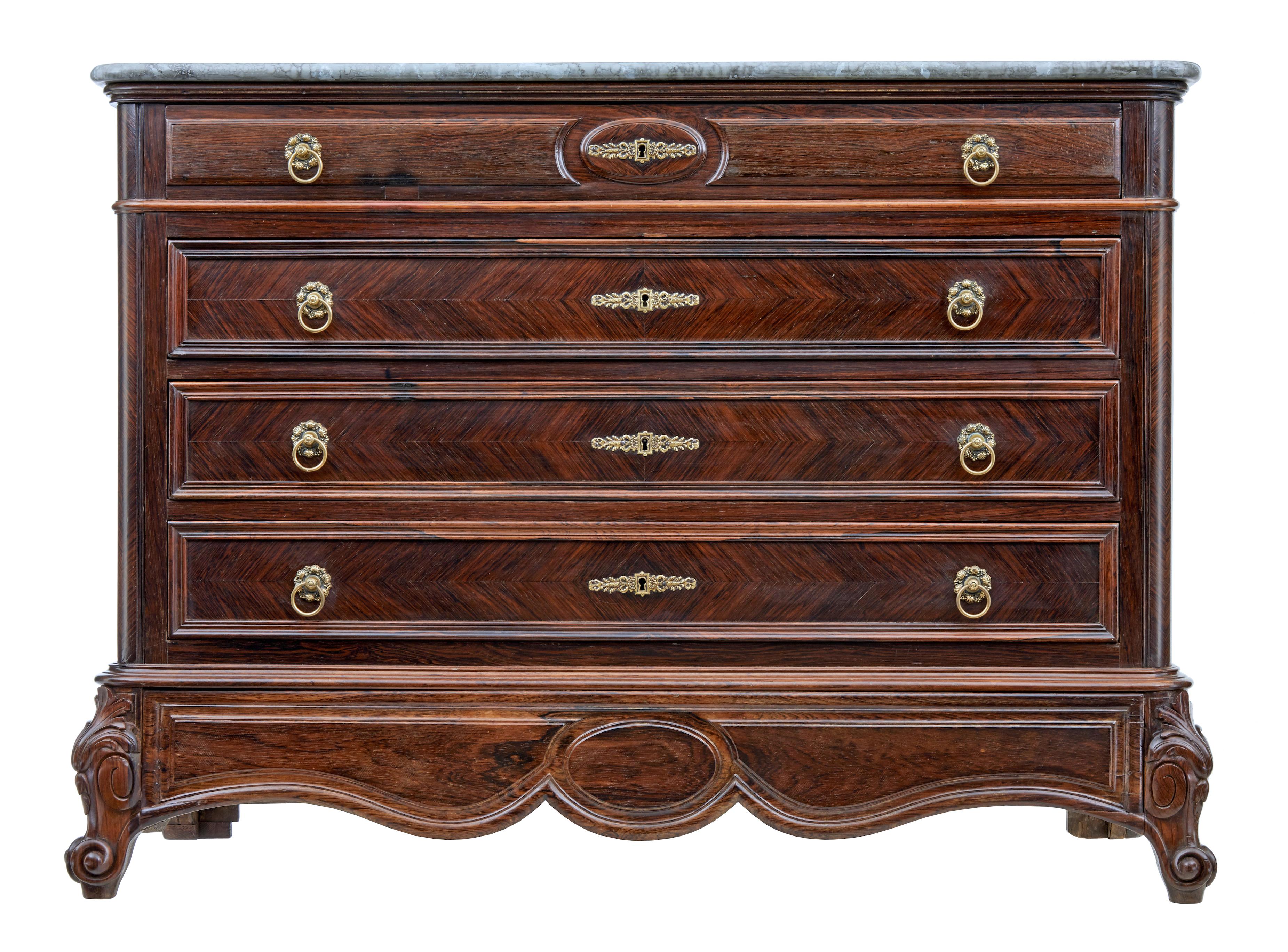 Large 19th century French palisander chest of drawers circa 1860.

Stunning french commode of grand proportions beautifully veneered in palisander from the rosewood family.

Fitted with 4 drawer's of equal proportions, decorated with beaded