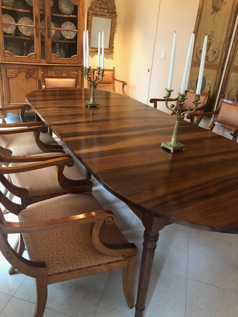 Made of richly patinated and very highly figured Circassian walnut with six turned tapering legs and casters. A round table extending with four leaves, each with attached apron. A very elegant 19th century Provincial table.
Made in the South of