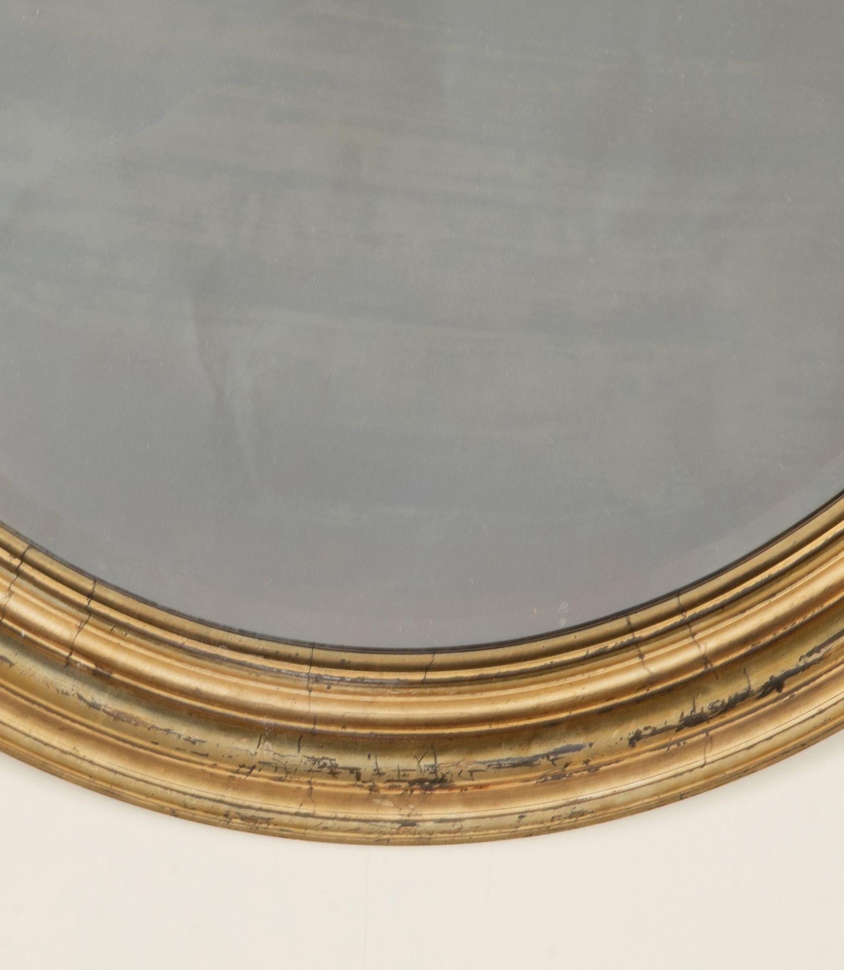 Neoclassical Large 19th Century French Renaissance Style Oval Giltwood Mirror For Sale