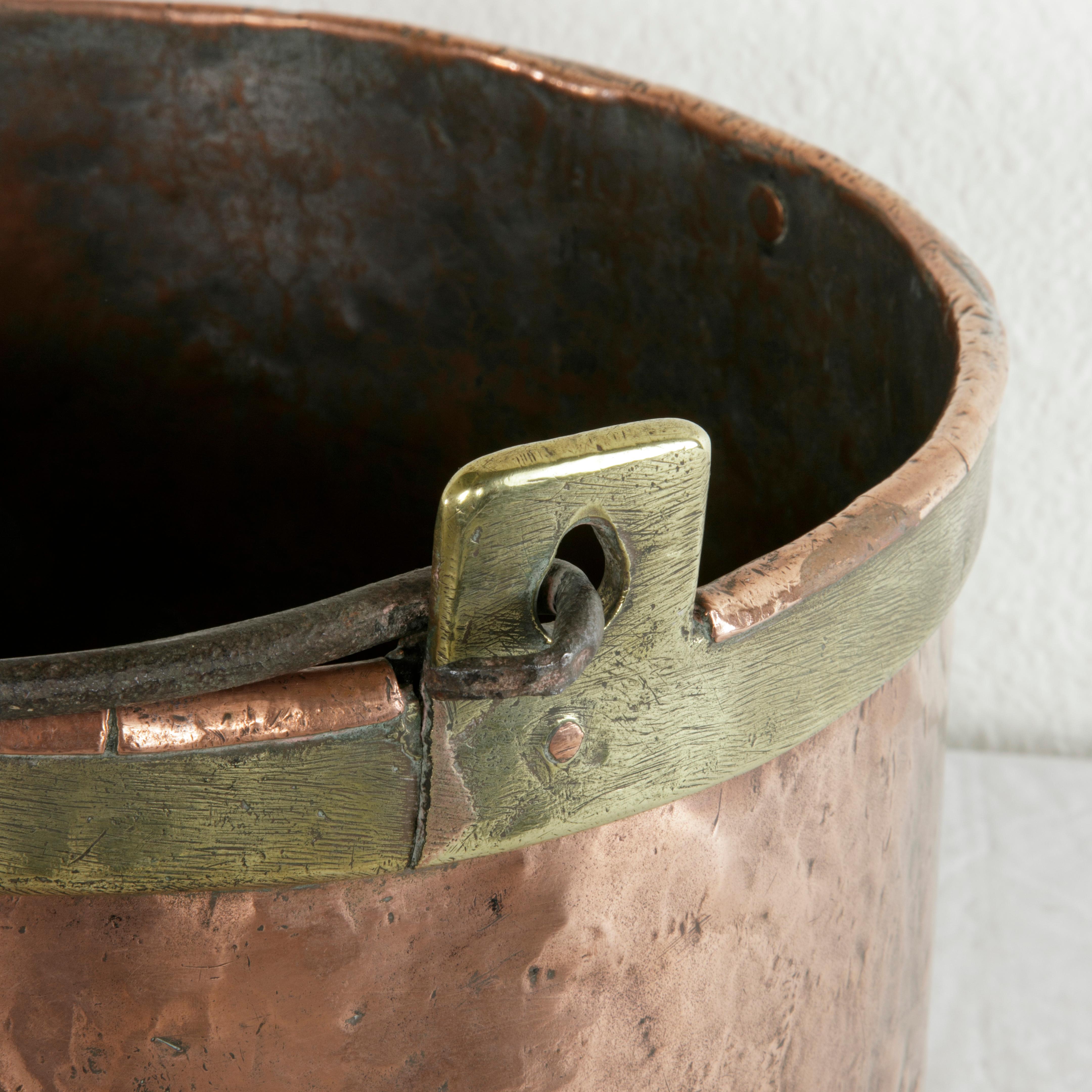 Large 19th Century French Riveted Copper Cauldron with Brass Banding and Handle In Good Condition In Fayetteville, AR
