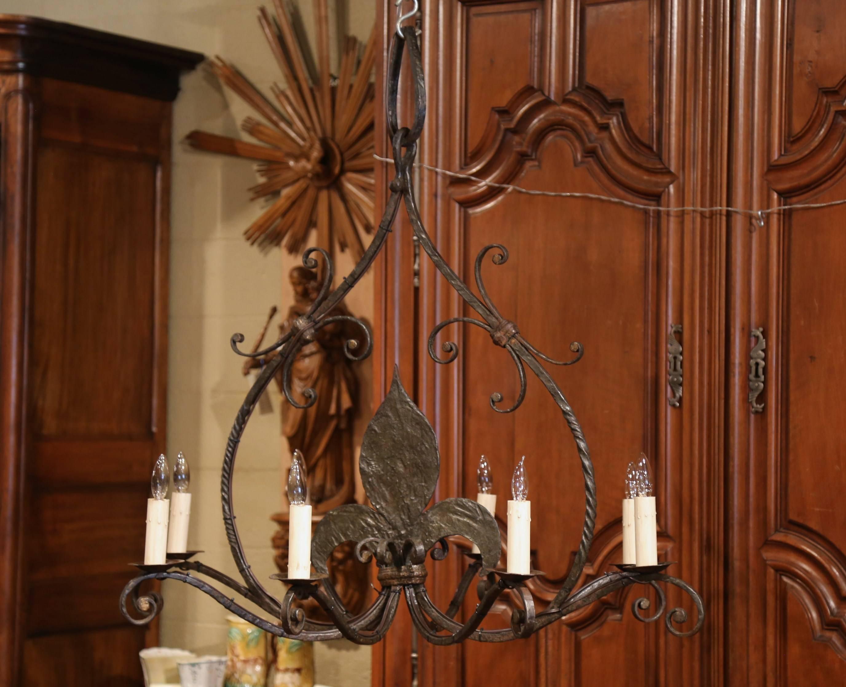 Patinated Large 19th Century French Wrought Iron Eight-Light Chandelier with Fleur-de-Lys