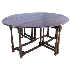 Grande table Gateleg/Sofa en chêne anglais du 19ème siècle