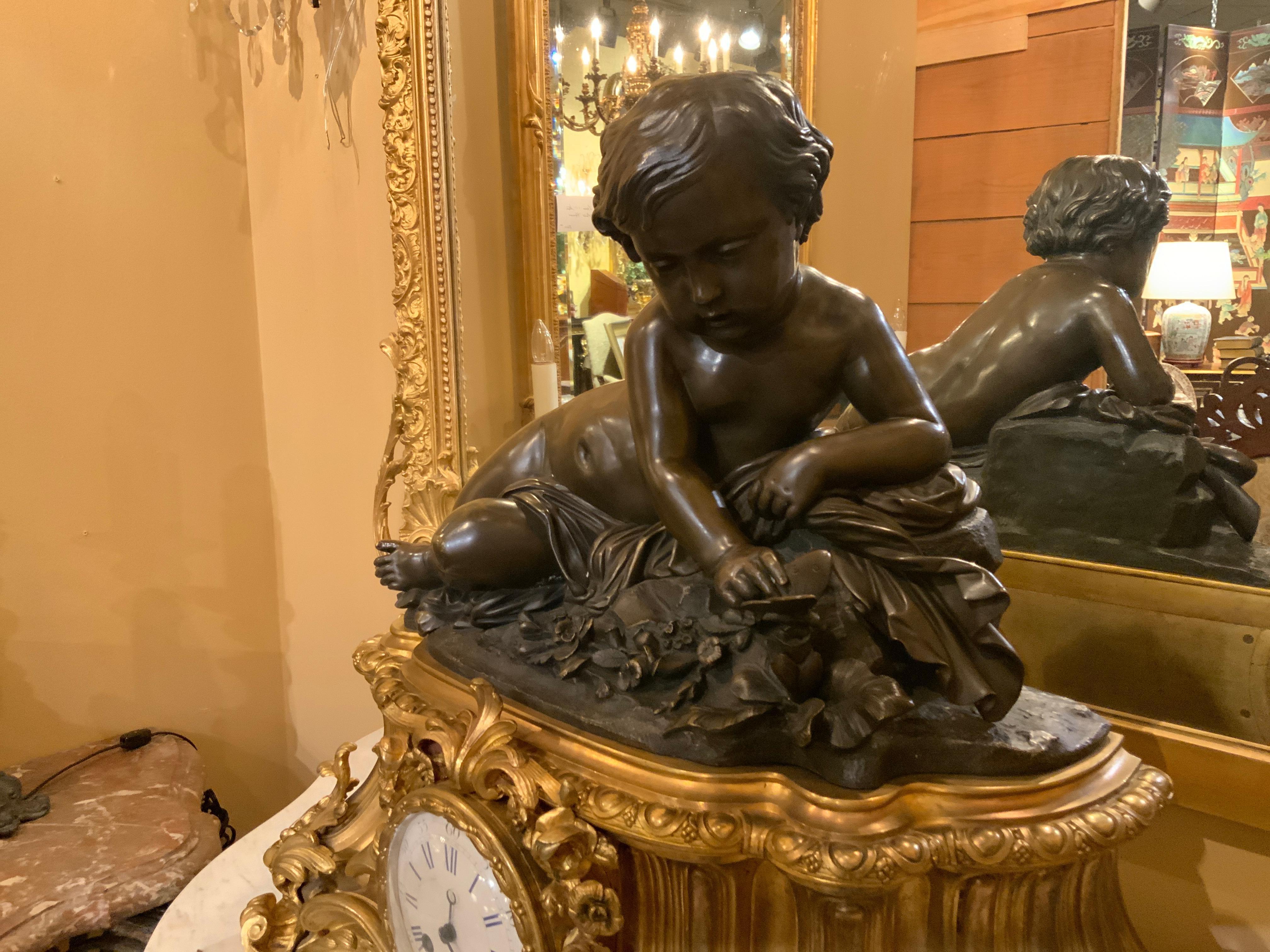 Large 19th Century Gilt Bronze Clock with Patinated Putto Mounted on the Top For Sale 6