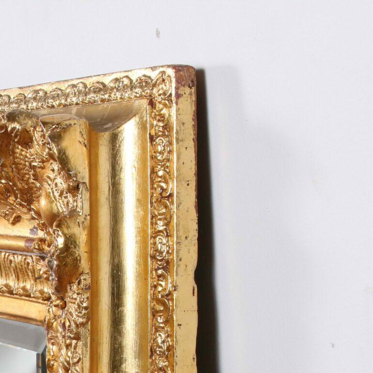 19th Century Gilt Carved Mirror. This piece is large and fabulous. Excellent carving and gilt detail. The mirror has a beautiful wide bevel.
Dimensions:
65″ wide
56″ tall
5″ deep