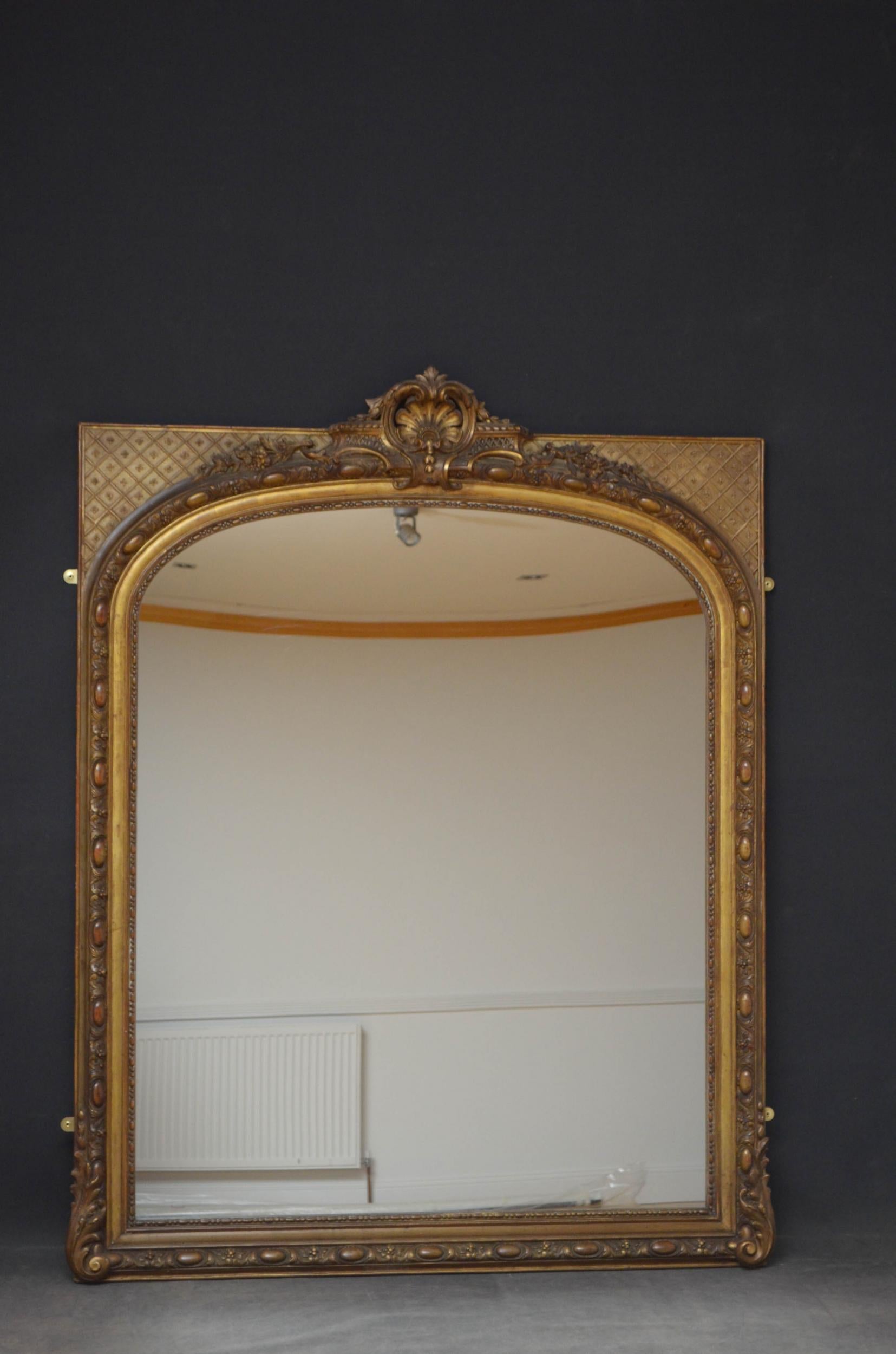 Sn4865 A large French giltwood wall mirror, having a replacement glass in beaded, gilded and painted frame with a foliage crest to the centre on symmetrical lattice work all flanked by leafy scrolls the the base. This antique mirror retains its