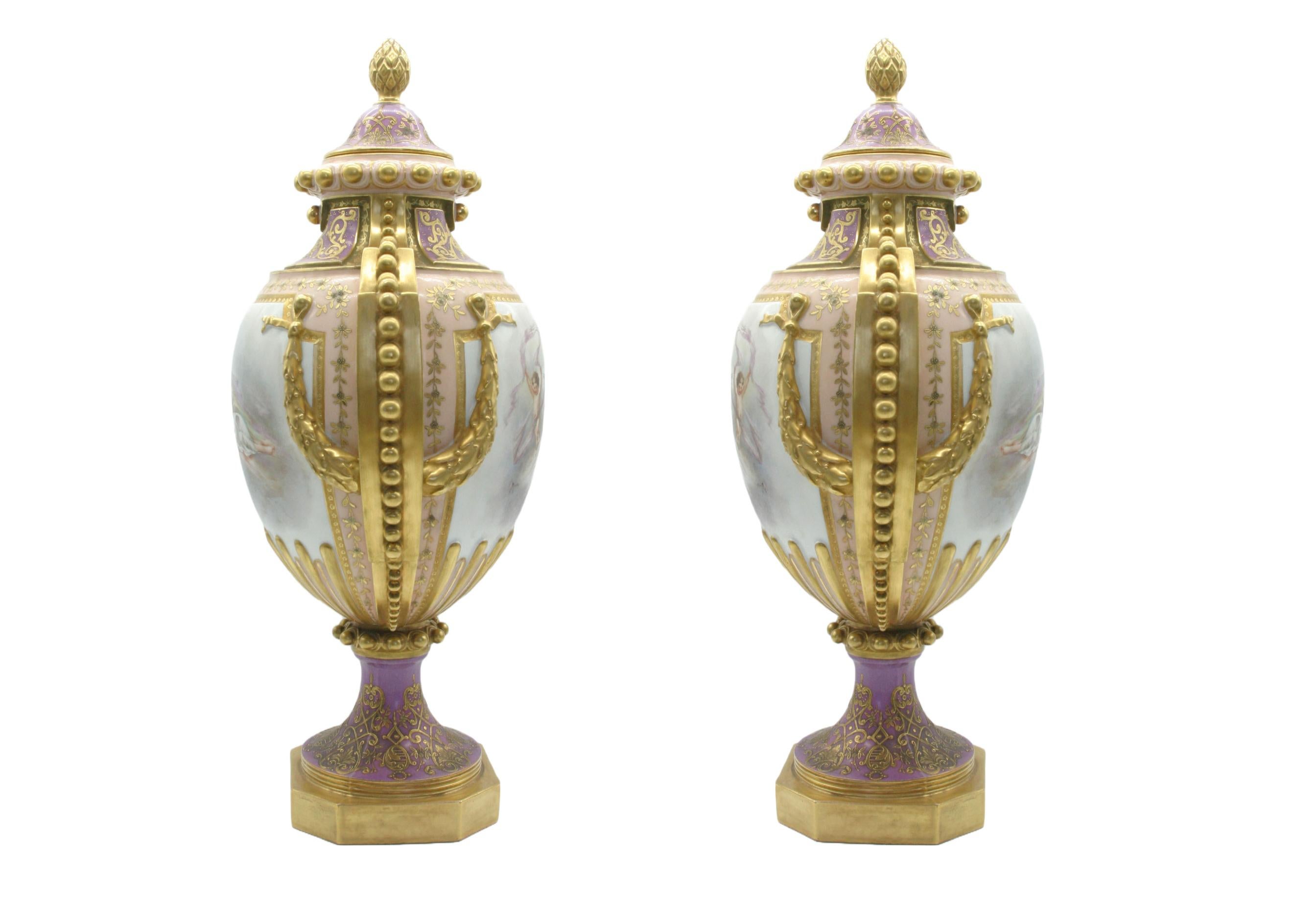 Large pair early 19th Century gild hand painted and crafted porcelain covered decorative urns / vases . Each urn features exterior painted scene details with gilt gold side handles. Each signed with pseudo sevres mark and artist signature 