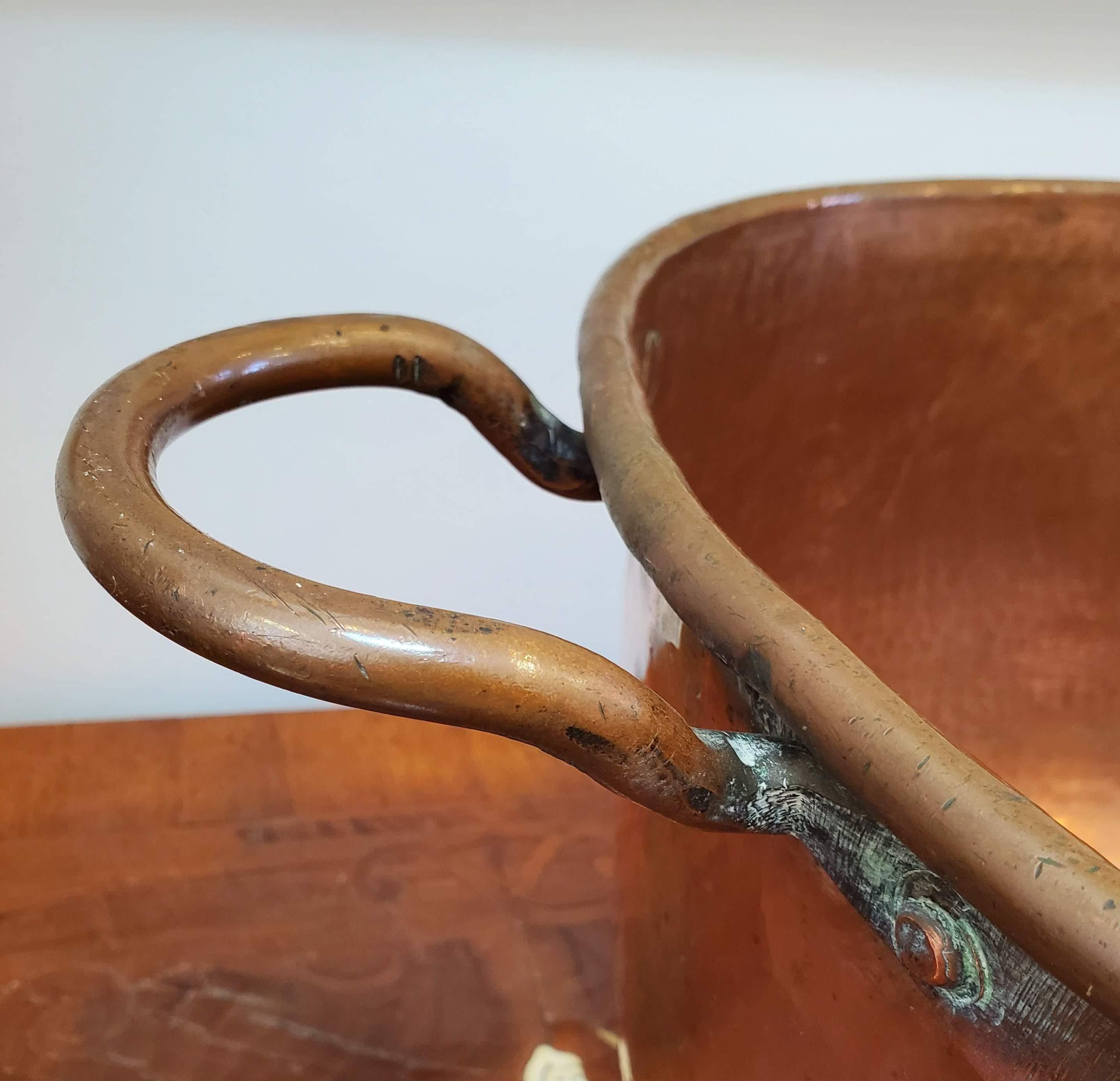 large copper pot with handles