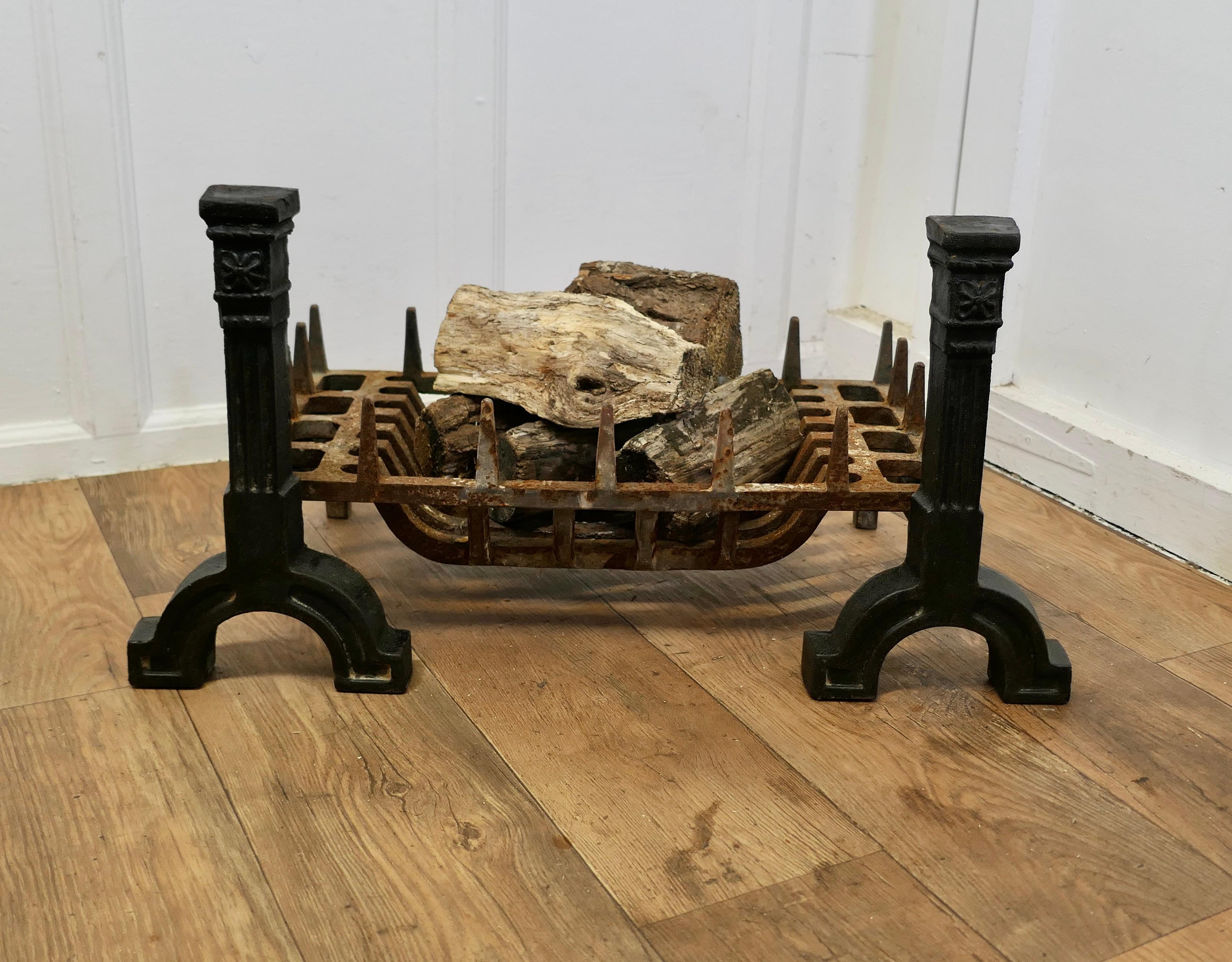 Large 19th Century Inglenook Fire Grate on Andirons

This is heavy hand Forged Iron Log Grate is supported on a Pair of Iron Andirons
The Grate is in very good but used condition and it is very heavy and would look superb in an open or Inglenook