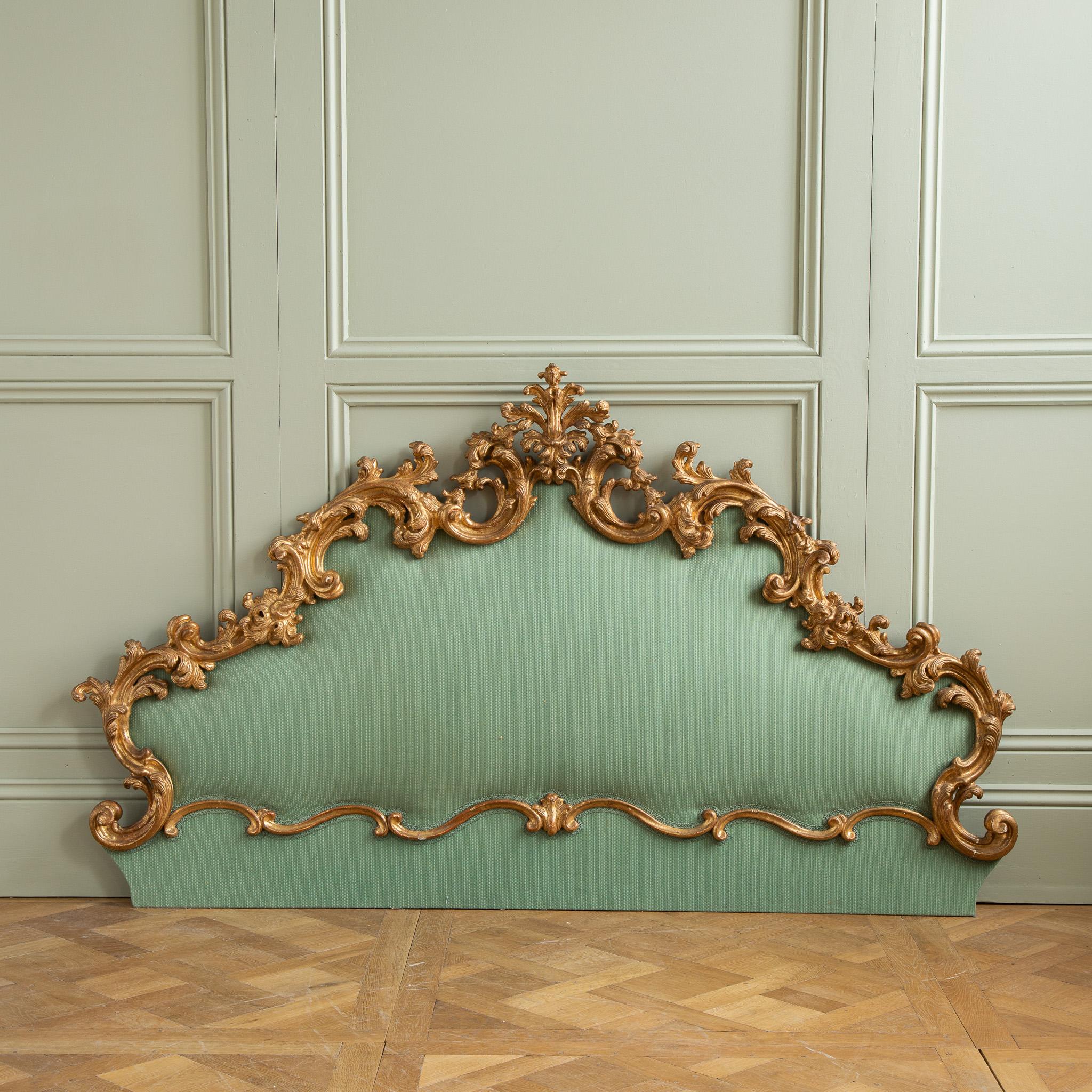 From Italy, home to master craftsmen, an original 19th century Headboard in the Venetian style. The frame features a lyrical, hand carved, design of interlacing S curves embellished with acanthus leaves. The headboard would have been originally made