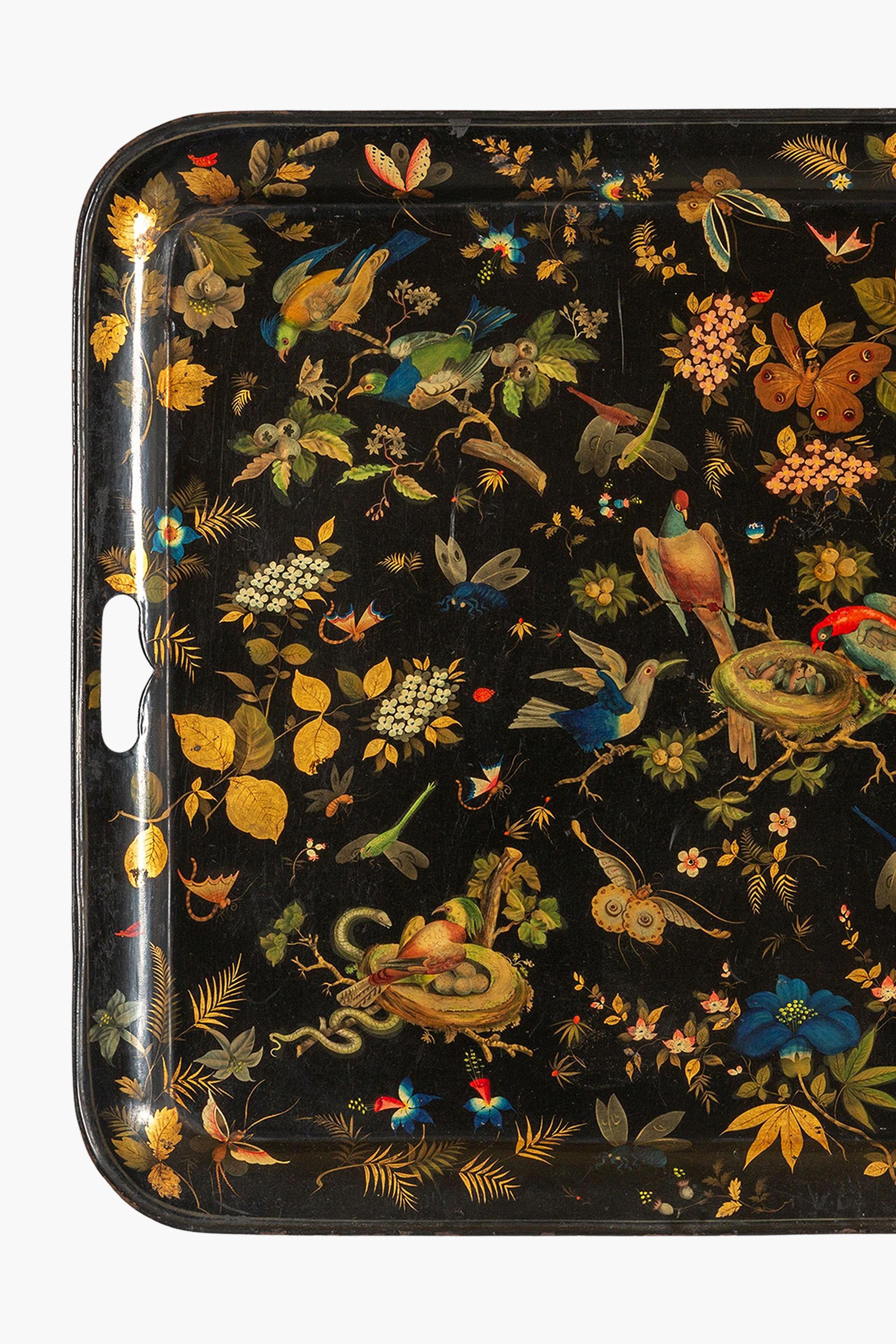 A large 19th Century Italian toleware tray, exquisitely hand-painted in polychrome and gold on a black ground. 

Decorated with exotic birds, insects and flora.

In wonderful original condition.

78x72 cm


