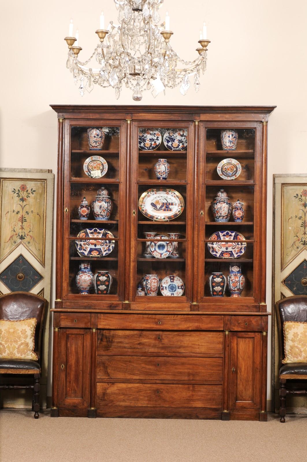 Large 19th Century Italian Walnut Bookcase with Glazed Doors and Center Drawers For Sale 1