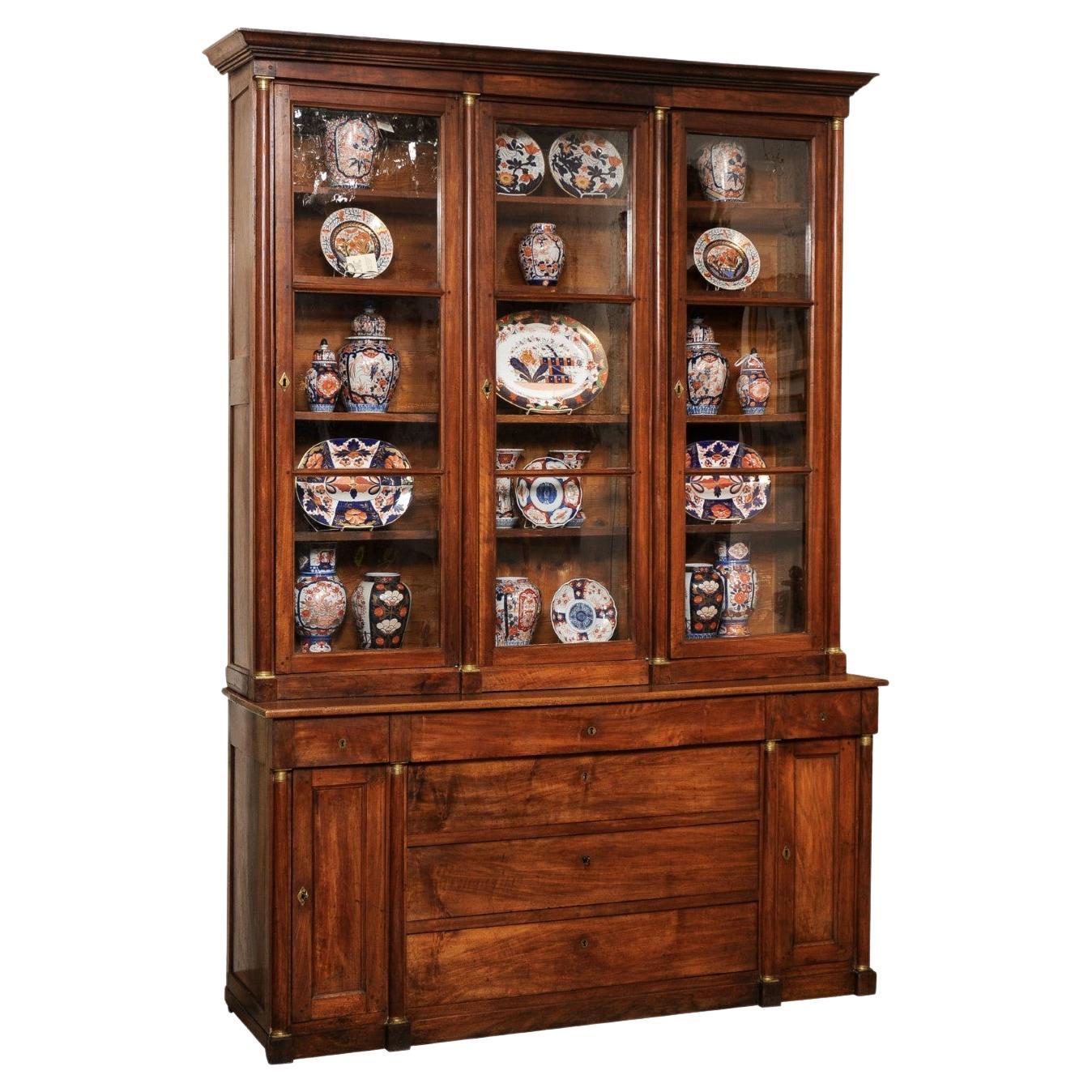 Large 19th Century Italian Walnut Bookcase with Glazed Doors and Center Drawers