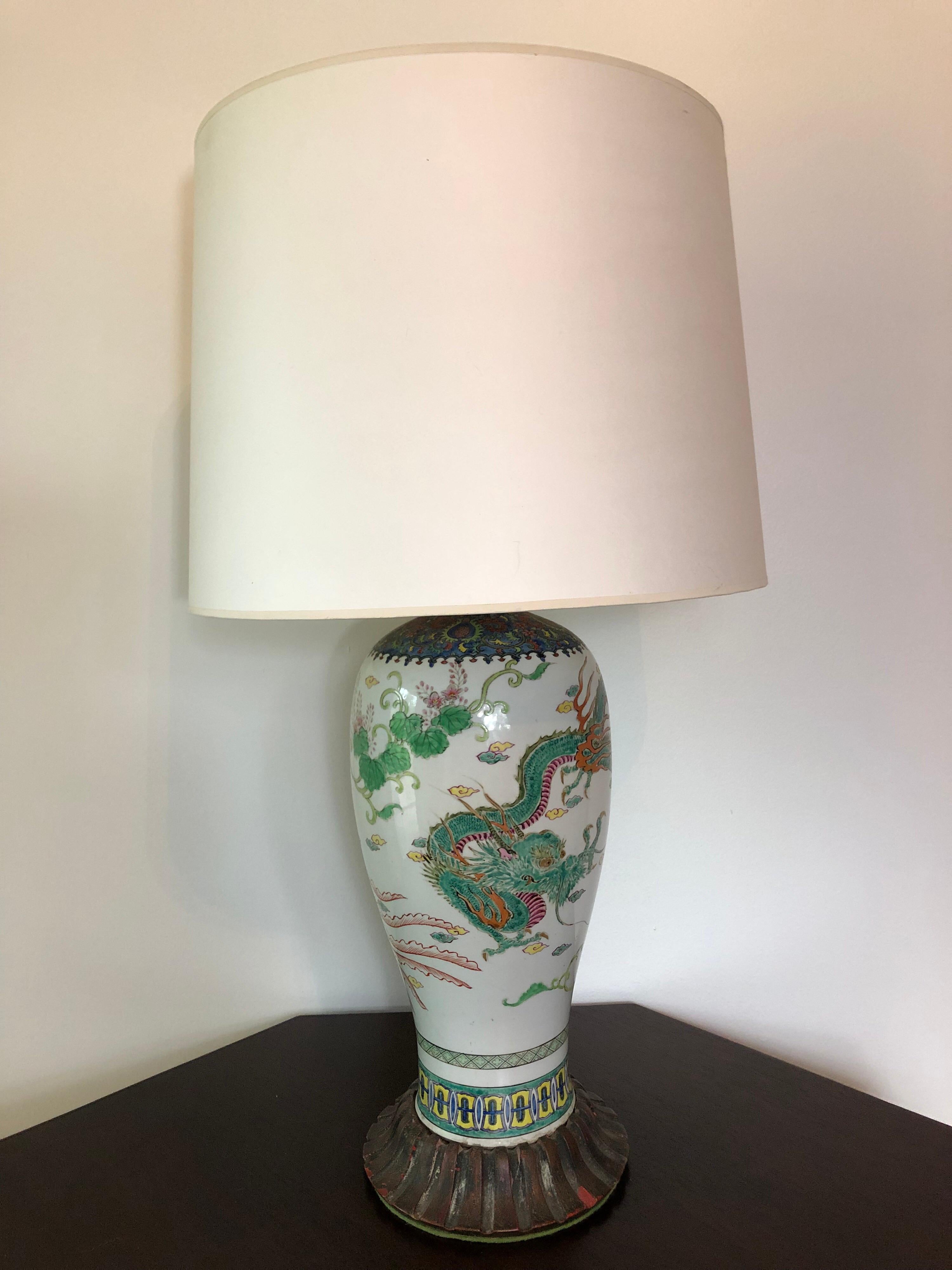 A large 19th century Japanese Imari vase, now as lamp. Mounted on vintage flutes base with brass fittings. Two sockets. Shade for display purposes only.