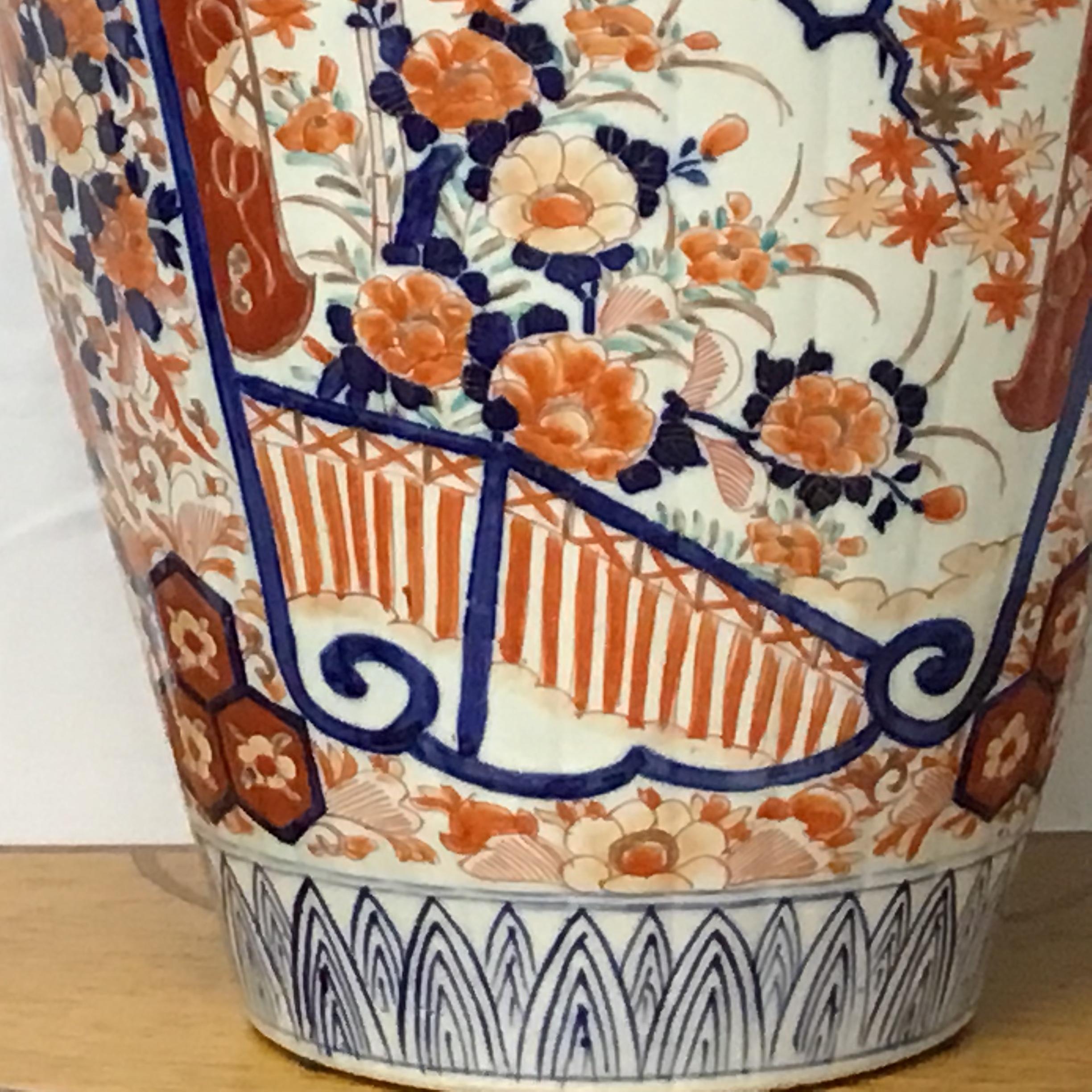 A large scale and very good quality late 19th century Japanese Imari vase with exotic birds, trees and flowers. Wonderful coloring in vibrant hues of blue, red and rust.