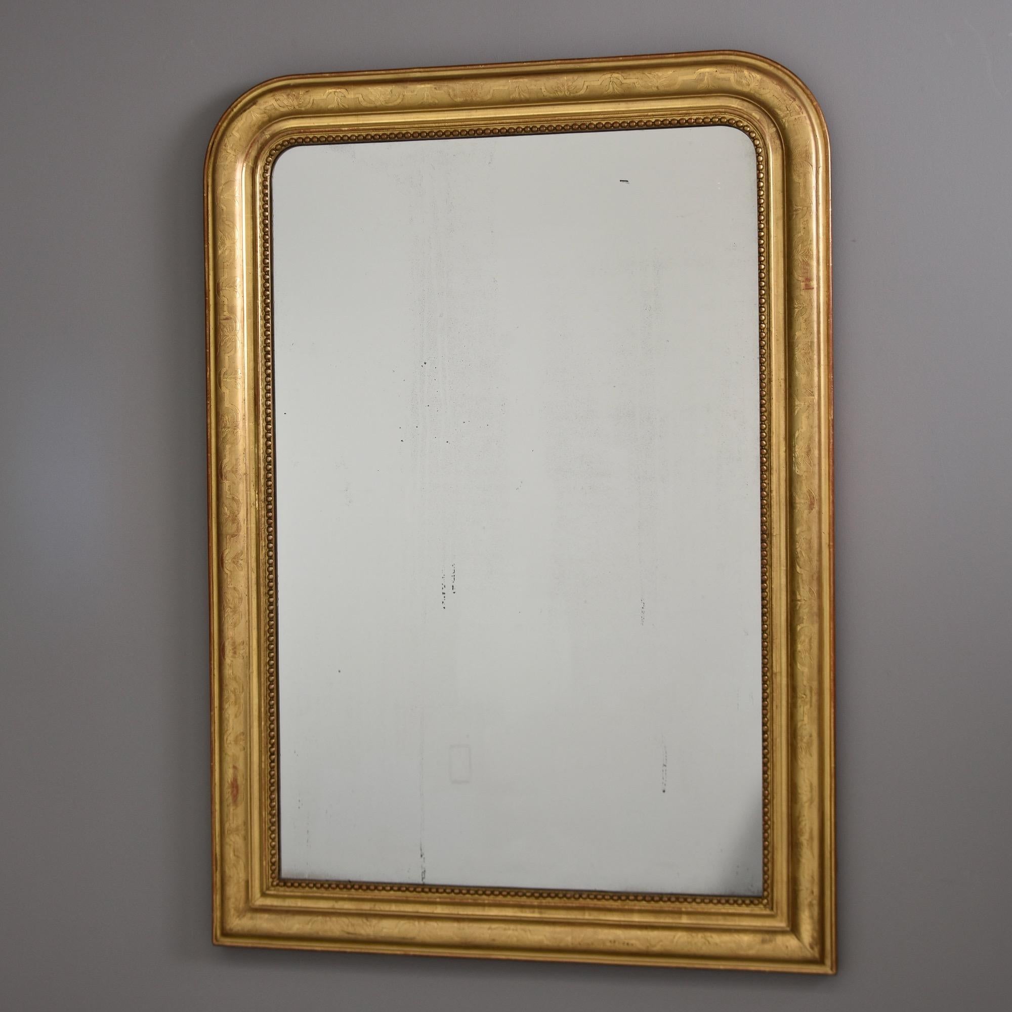 grand miroir asymetrique dore