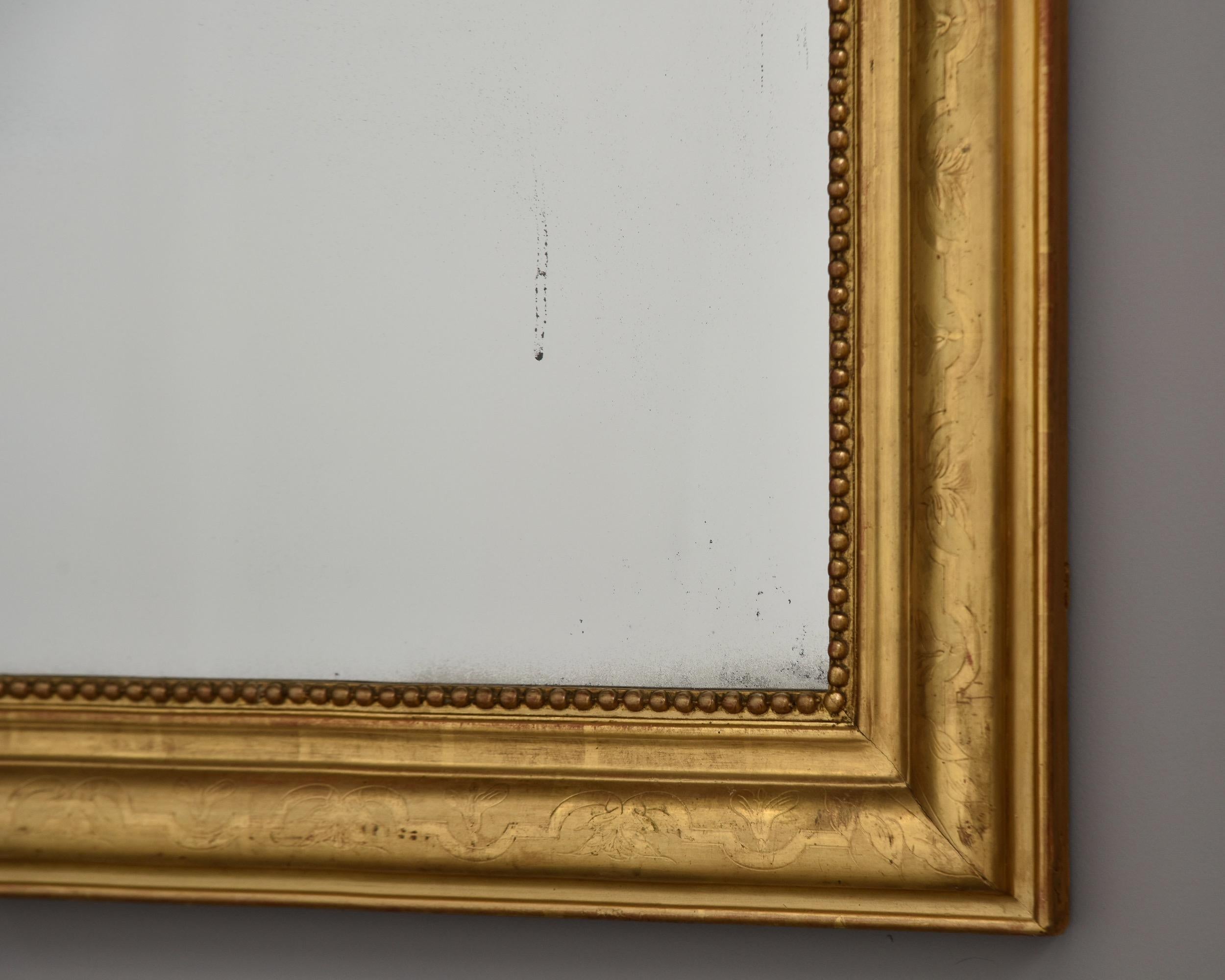 XIXe siècle Grand miroir à cadre doré Louis Philippe du 19ème siècle en vente