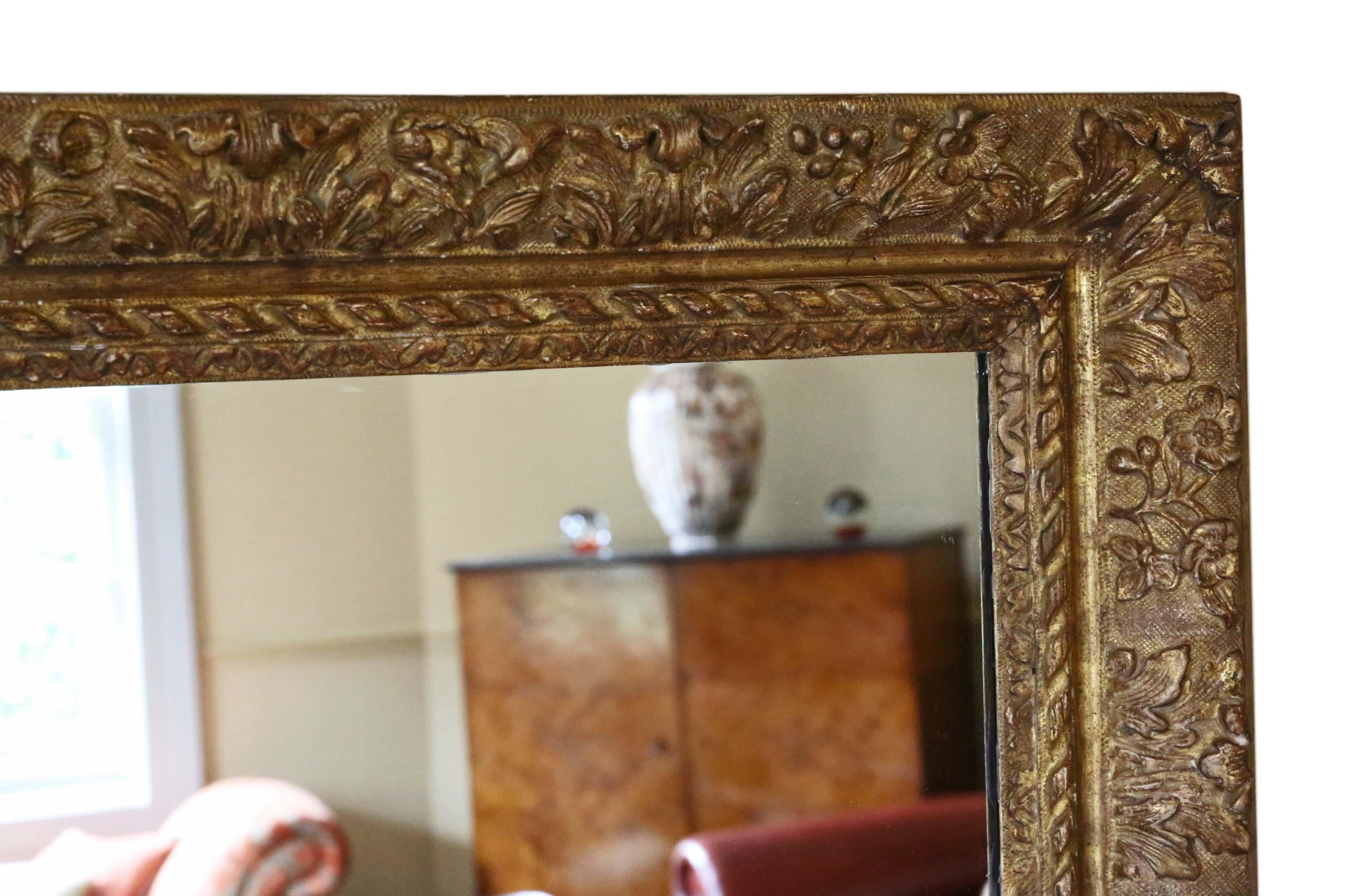 19th Century Louis XIV style gilt overmantle or wall mirror. A great look. Believed to have originally housed an early 17th Century Dutch painting by Jan Van Goyen (his paintings can reach high 6 figure sums). Not sure how old the frame is but