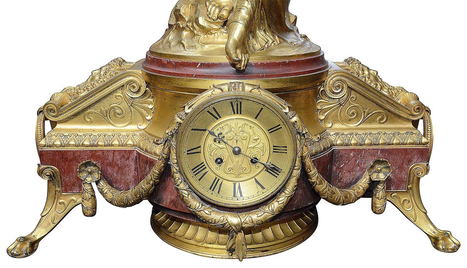 French Large 19th Century Louis XVI style gilded ormolu clock set. For Sale