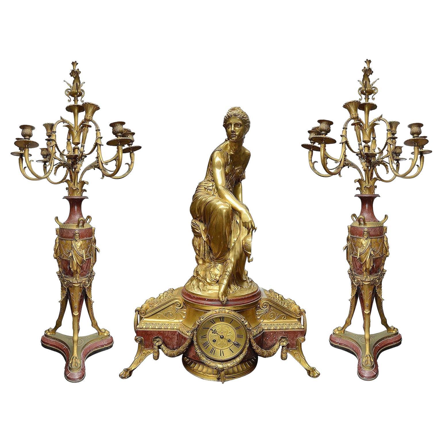 Large 19th Century Louis XVI style gilded ormolu clock set. For Sale