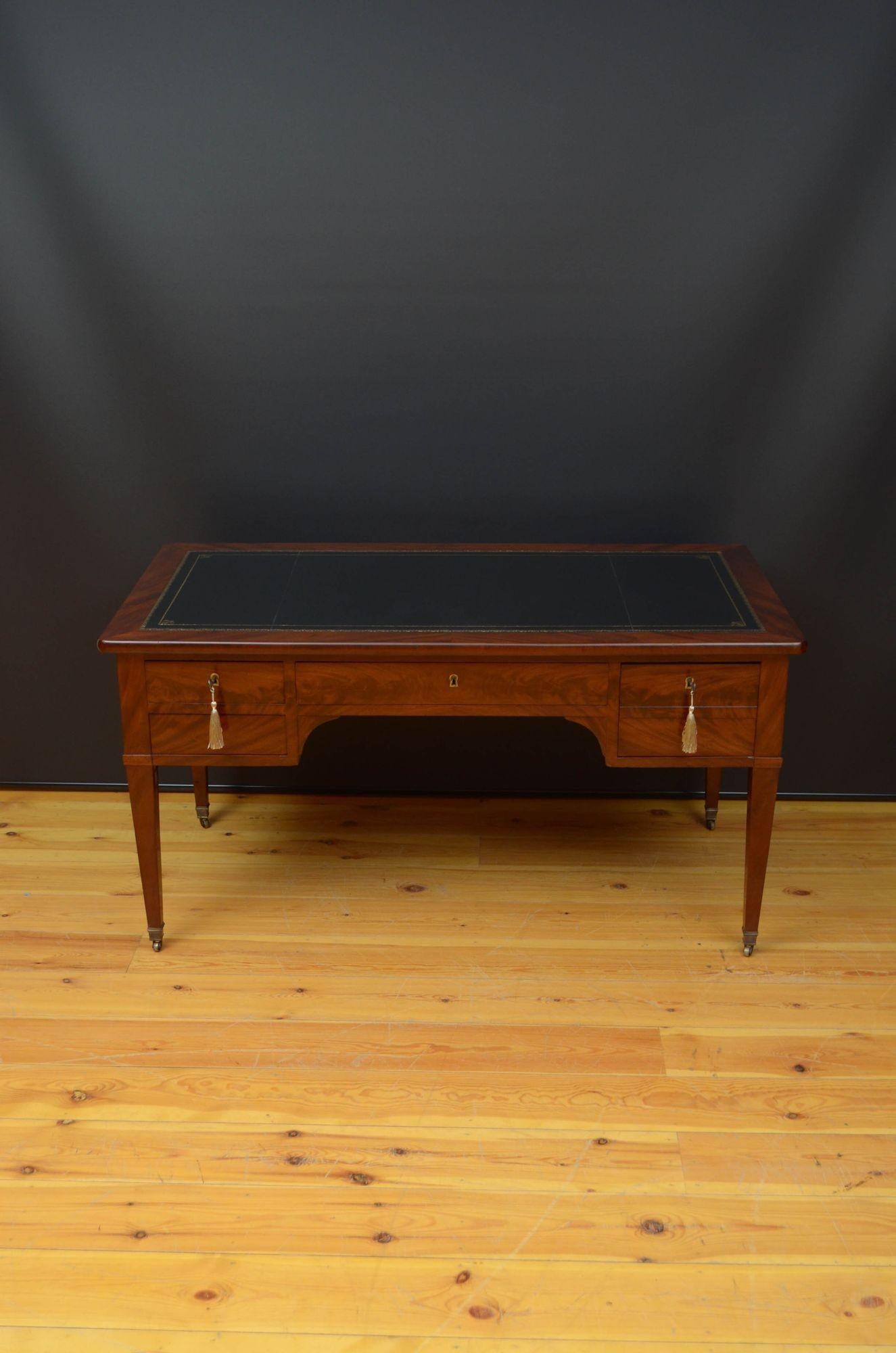 Sn5273 Fine quality 19th century flamed mahogany writing desk of generous proportions, having new black leather to the top flanked by two sliders which retain an older leather in good condition above flamed mahogany centre drawer, two drawers to