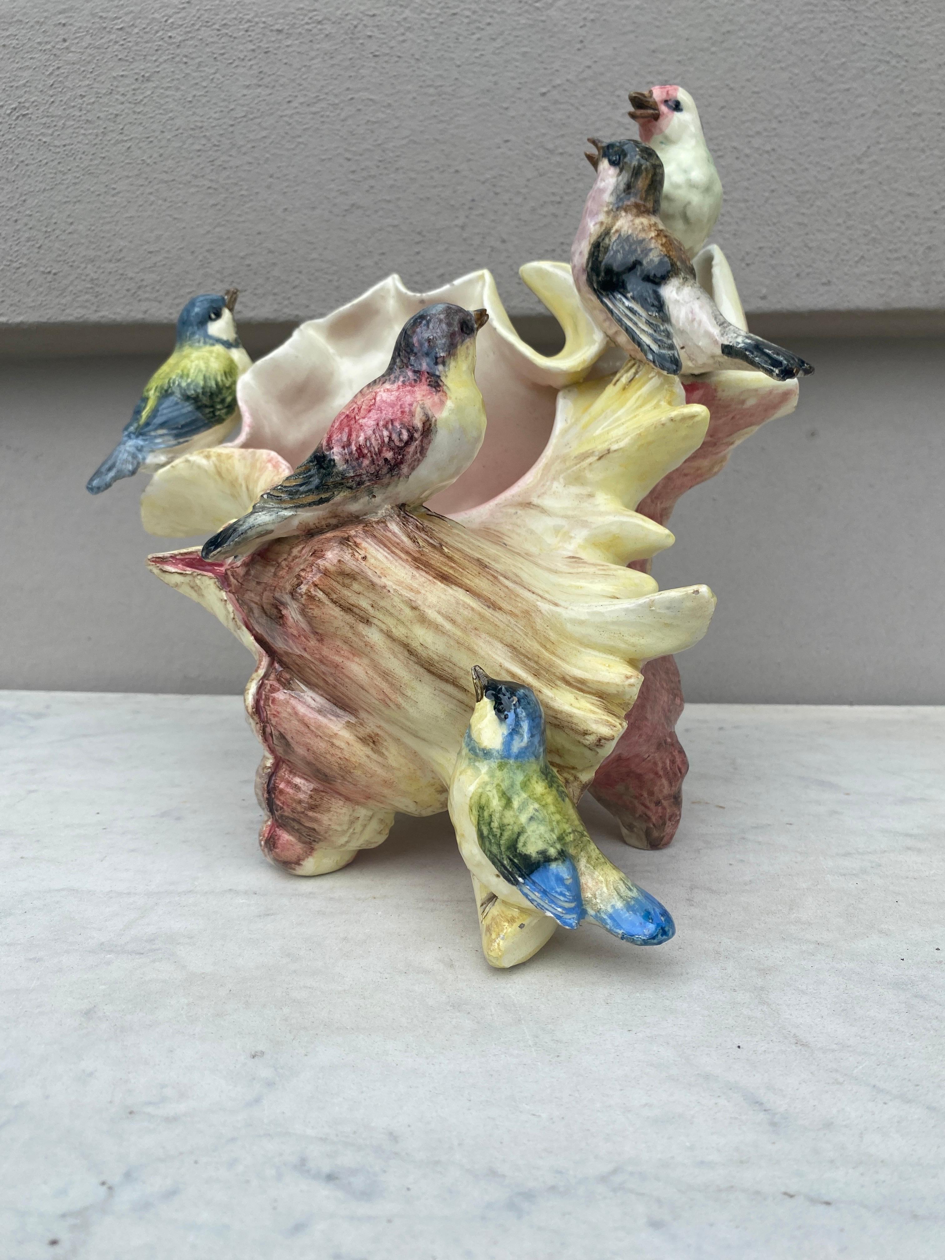 A stunning large Majolica shell with five birds, very colorful Delphin Massier.
The Massier are known for the quality of their unique enamels and paintings.
The Massier family produced differents pieces with birds in a very creative style in