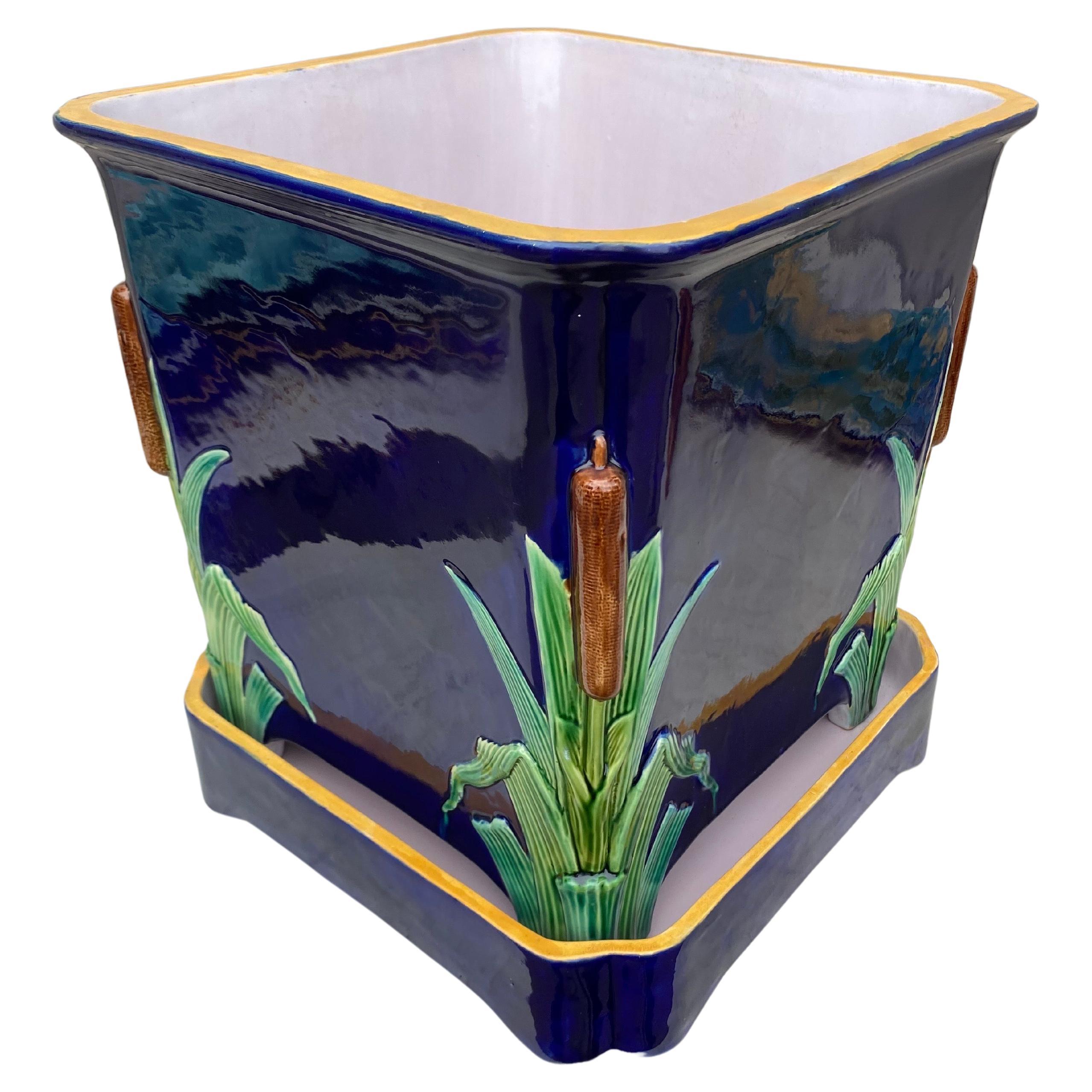 Minton Majolica cobalt blue jardiniere on stand c.1875, the square sectioned jardiniere simply decorated with a cattail on each corner.
Largest size.
Rare size.
