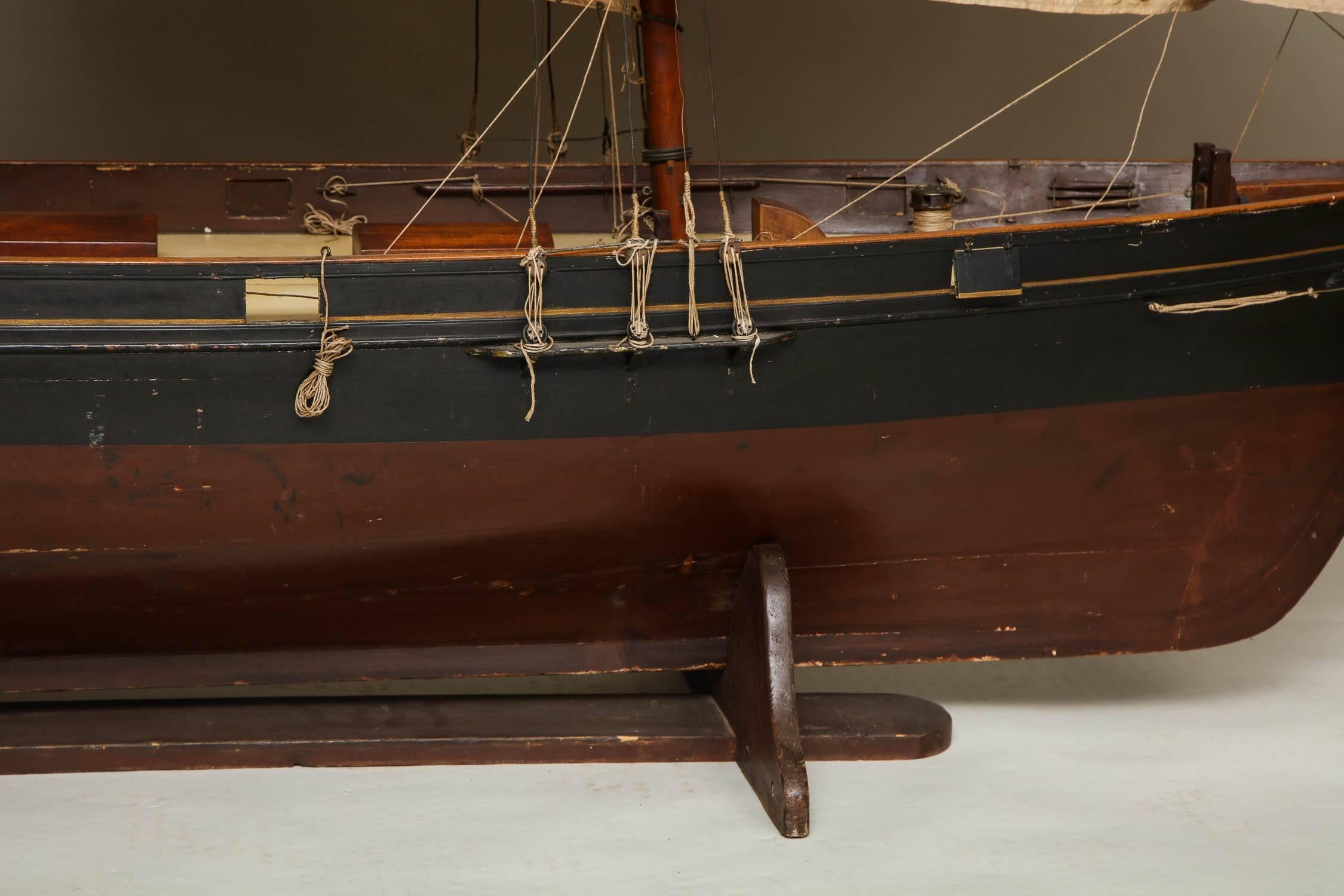 Impressive and rare example of a model English merchant sailing vessel, circa 1860, that plied the China Trade from England to Hong Kong.  The ship has the sail rig of the Sandy Hook pilot boats, of which the 