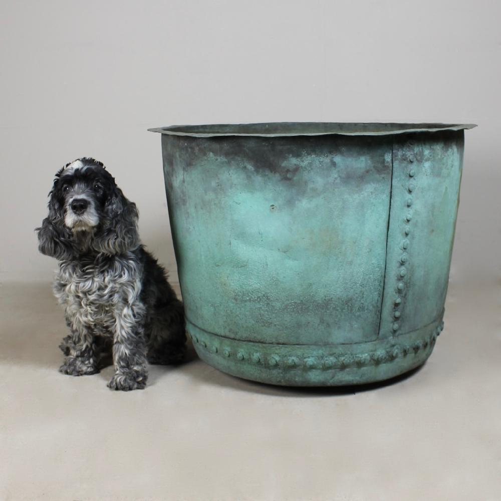 A large 19th century riveted copper planter / log bin, with the most beautiful and natural verdigris patination, simply the best of color.
English, second half of the 19th century.