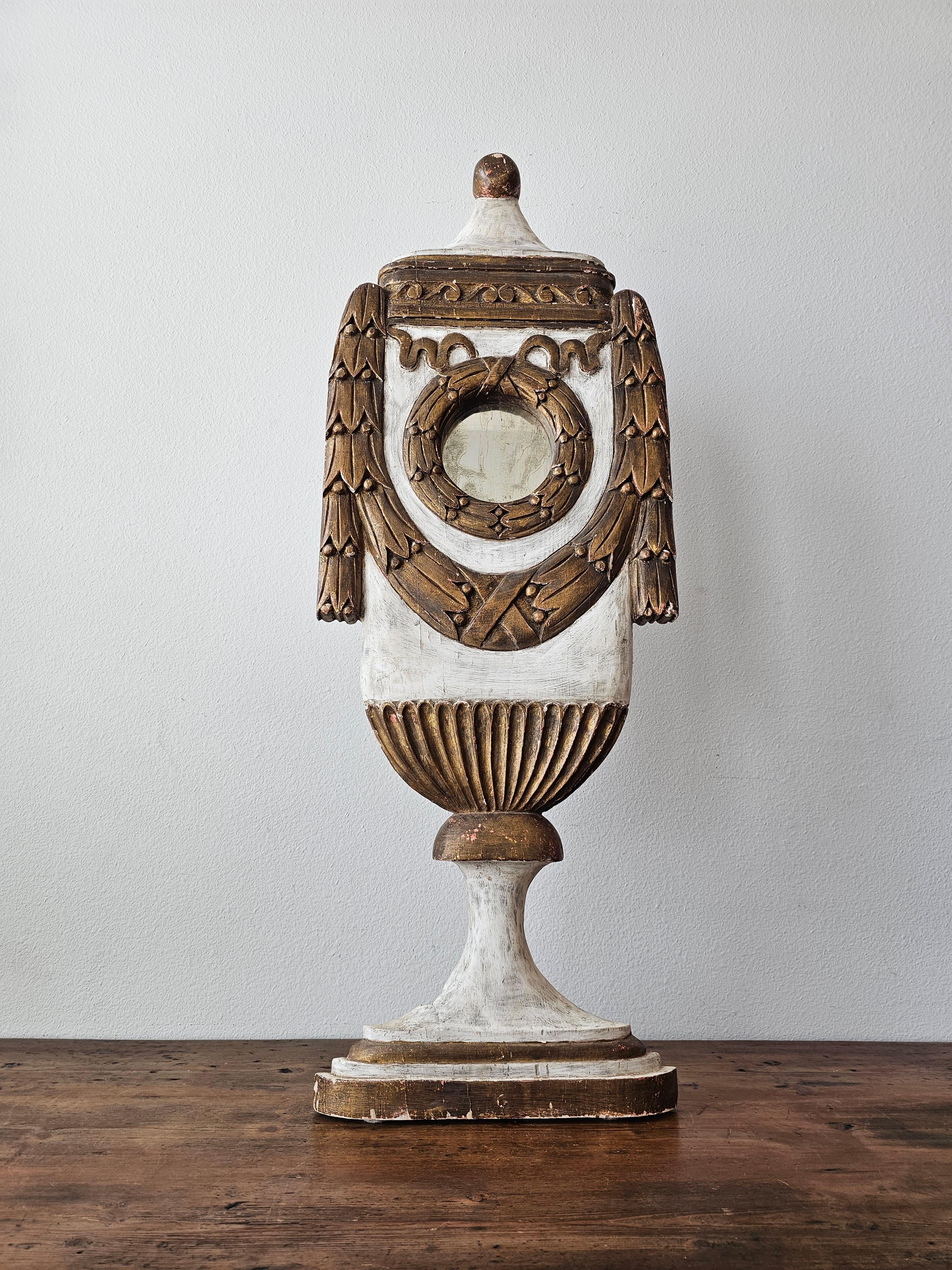 A scarce, large and most impressive European antique urn-form mirrored wooden statue. 

Late 19th century, most likely Italian, possibly French, hand carved, painted and gilded solid wood, exceptionally executed in luxurious Roman Neo-classical