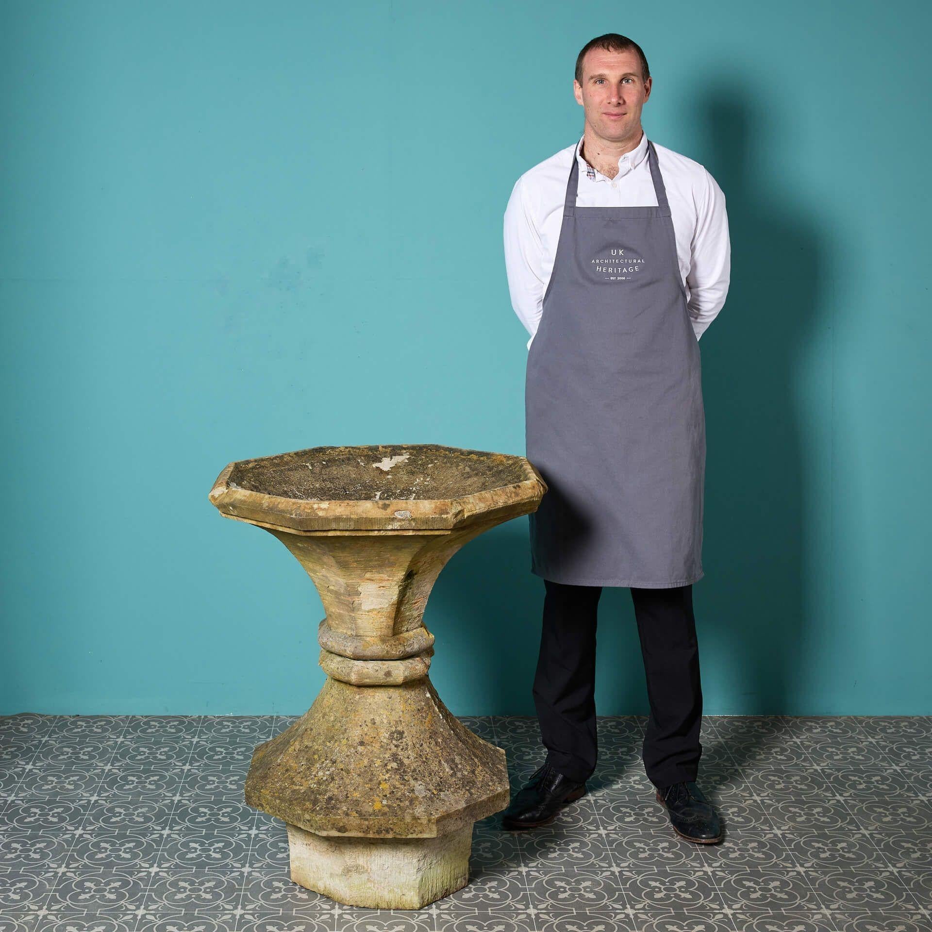 A large scale and characterfully weathered 19th century octagonal york stone bird bath, circa 1870. This beautiful stone bird bath will make a stunning centrepiece of gardens both old and new. It features a defined hourglass body and shallow, tooled