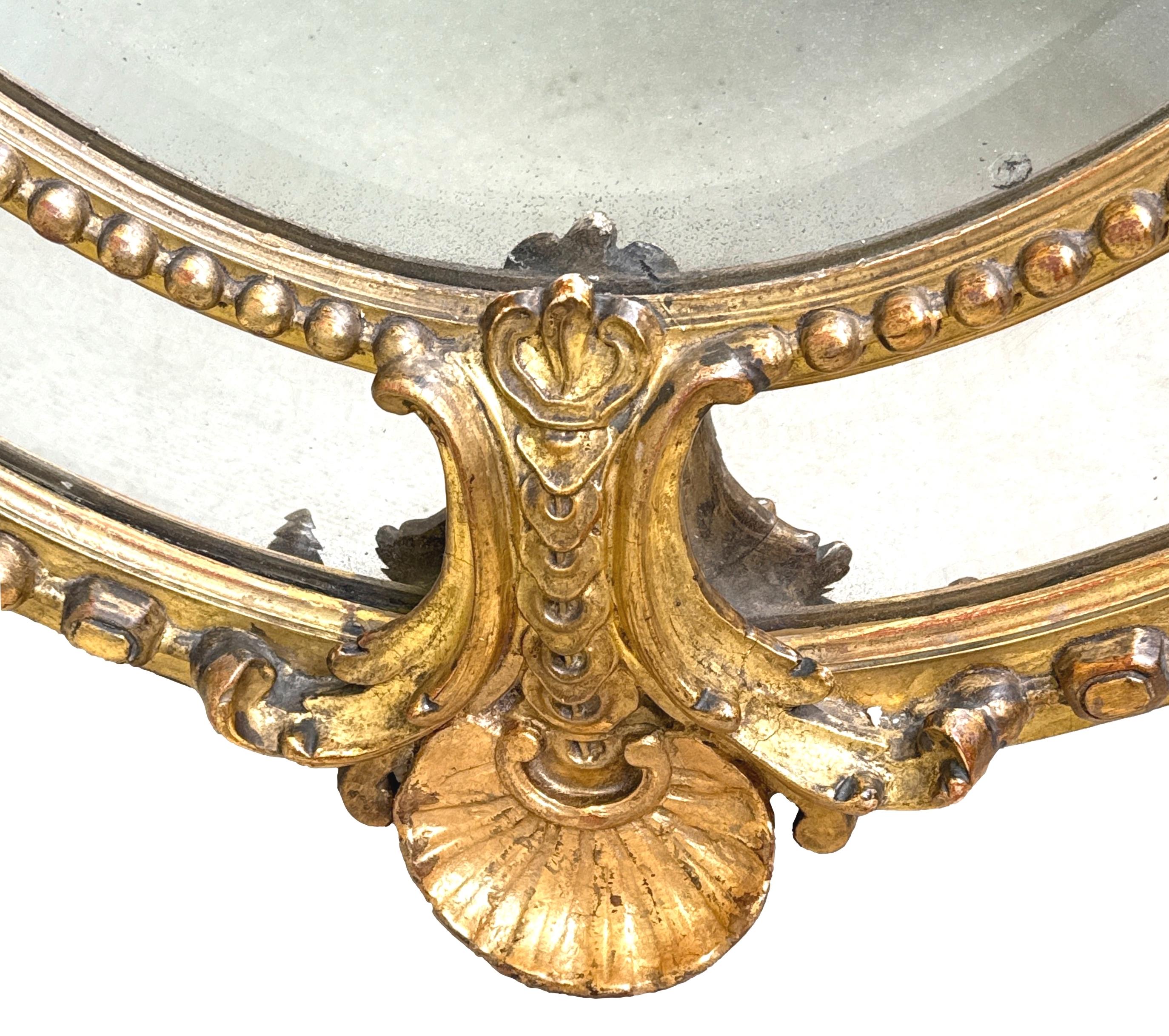 Vittoriano Grande specchio da parete ovale dorato del XIX secolo in vendita