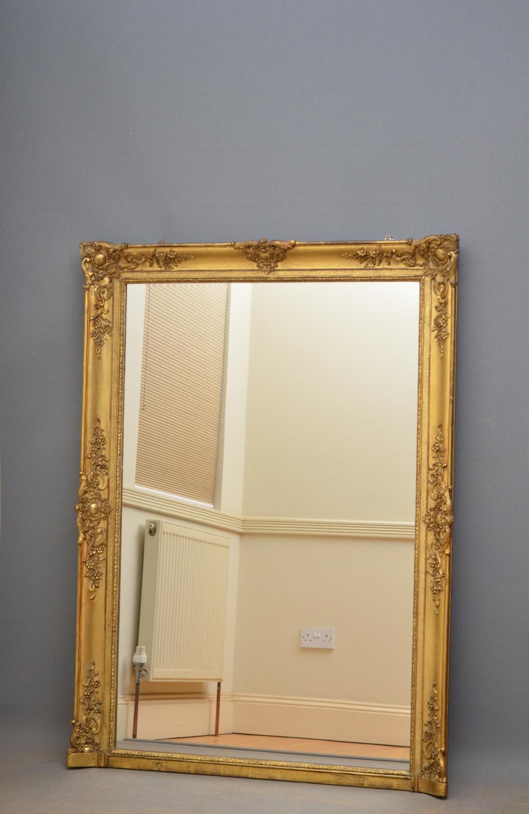 Sn4361, a large giltwood floor standing or overmantle mirror with original mirror plate with some foxing in finely carved frame, all in wonderful original condition throughout, ready to place at home, circa 1880.
Measures: H 60