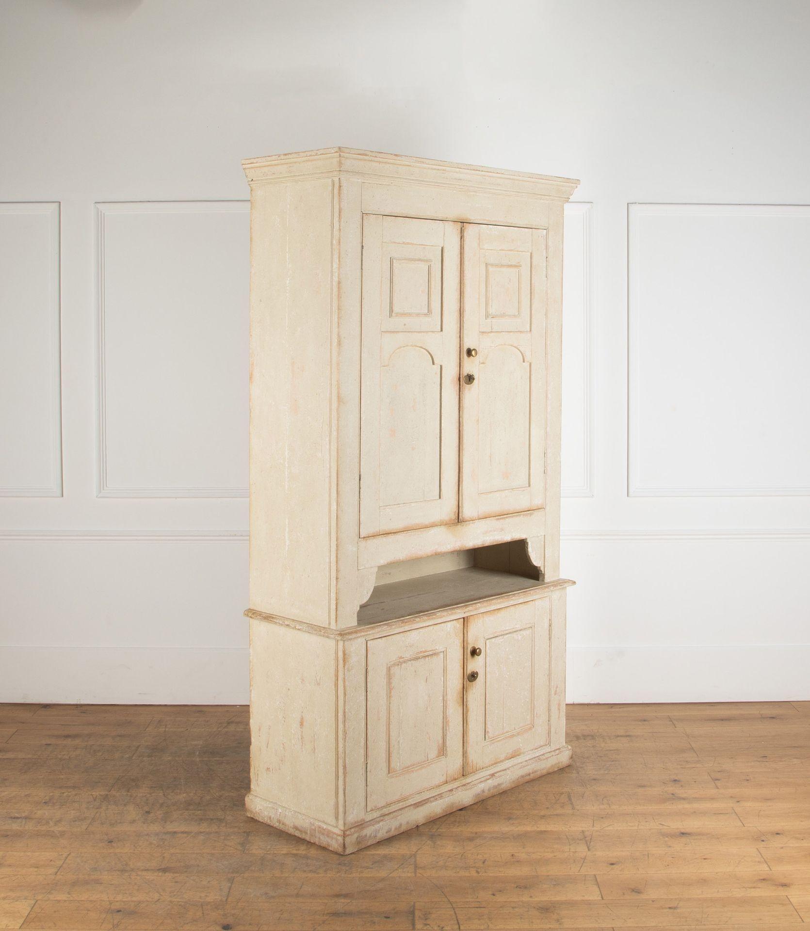 Large 19th Century painted pine four door housekeeper cupboard.

In good condition for its age with signs of wear throughout.