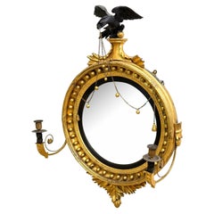 Grand miroir convexe en bois doré de style Régence du 19e siècle