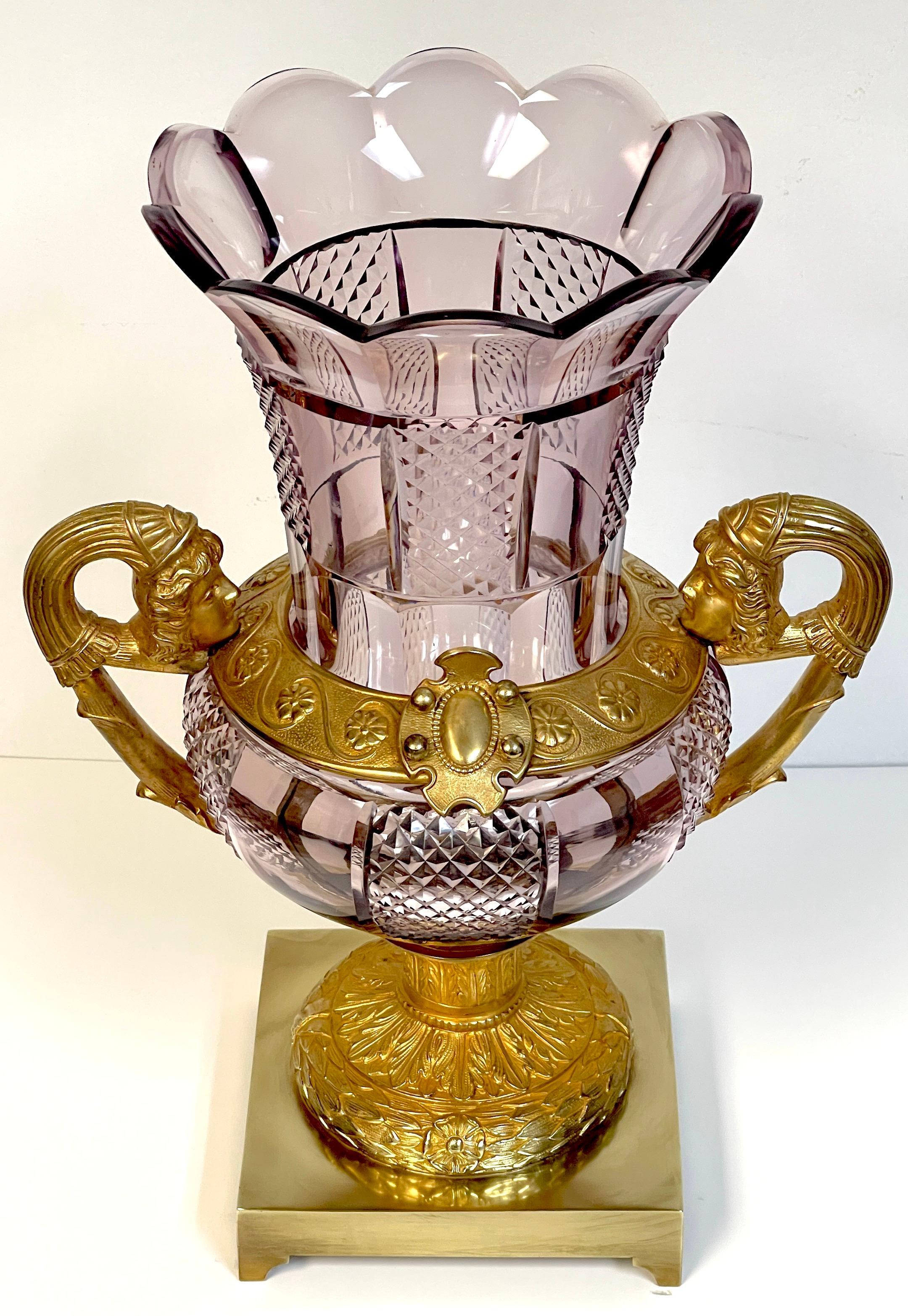 Large 19th-century Russian Neoclassical Ormolu and Amethyst Cut Glass Vase
St. Petersburg, mid-19th century 

Offering a magnificent glimpse into 19th-century Russian Neoclassicism, this large and imposing vase hails from St. Petersburg, embodying