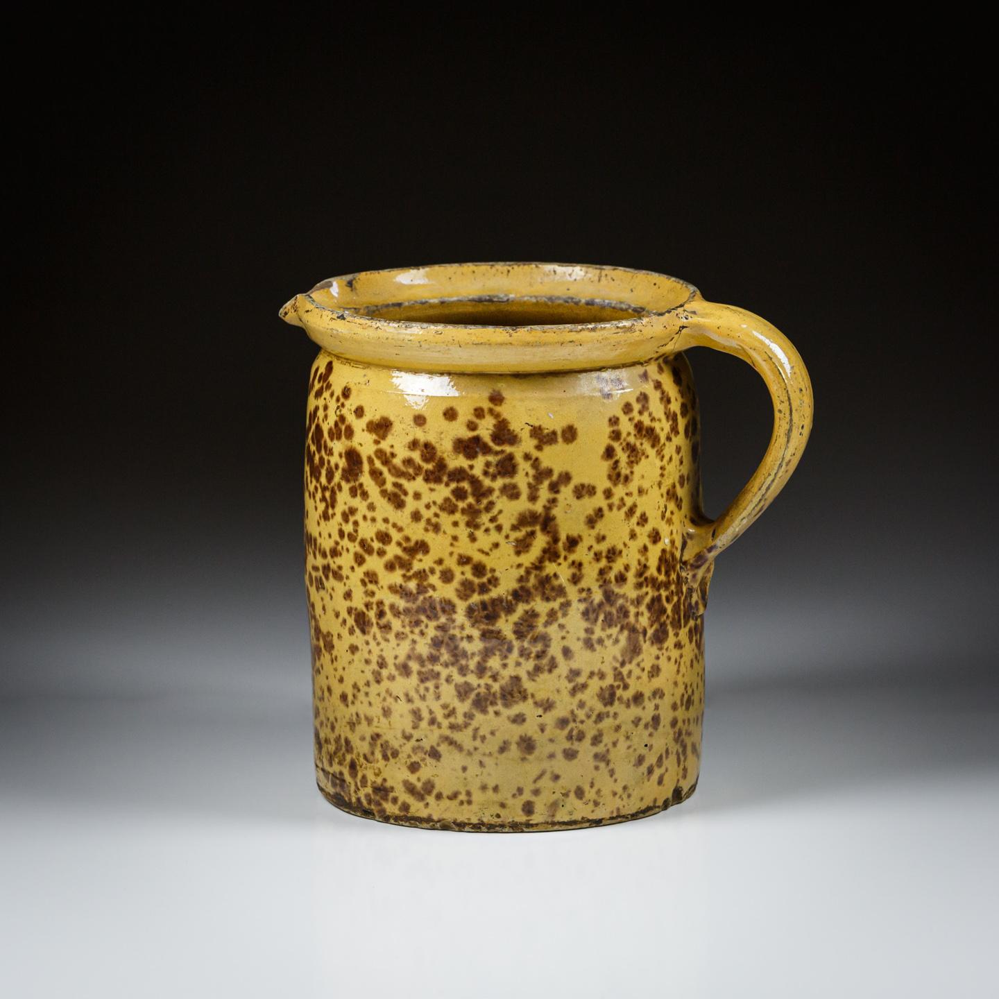 Large 19th Century Slipware Jug. Extraordinary slip decoration. Aside from minor nibbles and minor losses to glaze good condition. France Circa 1820.
