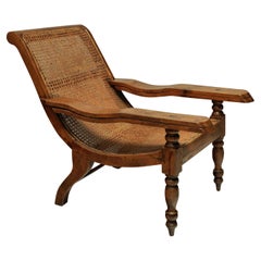 Grande chaise de plantation coloniale en teck massif du 19ème siècle