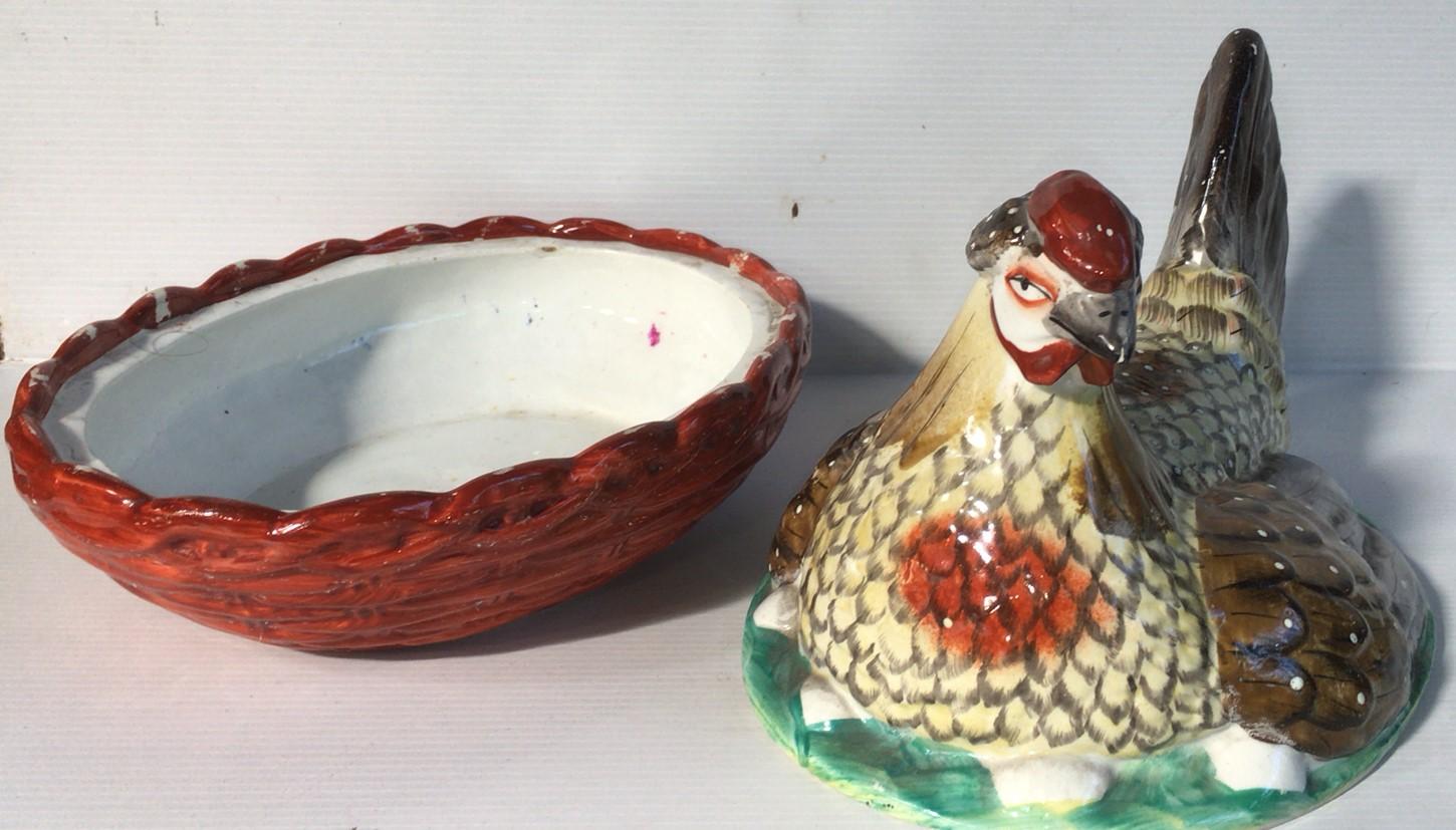 antique hen on nest