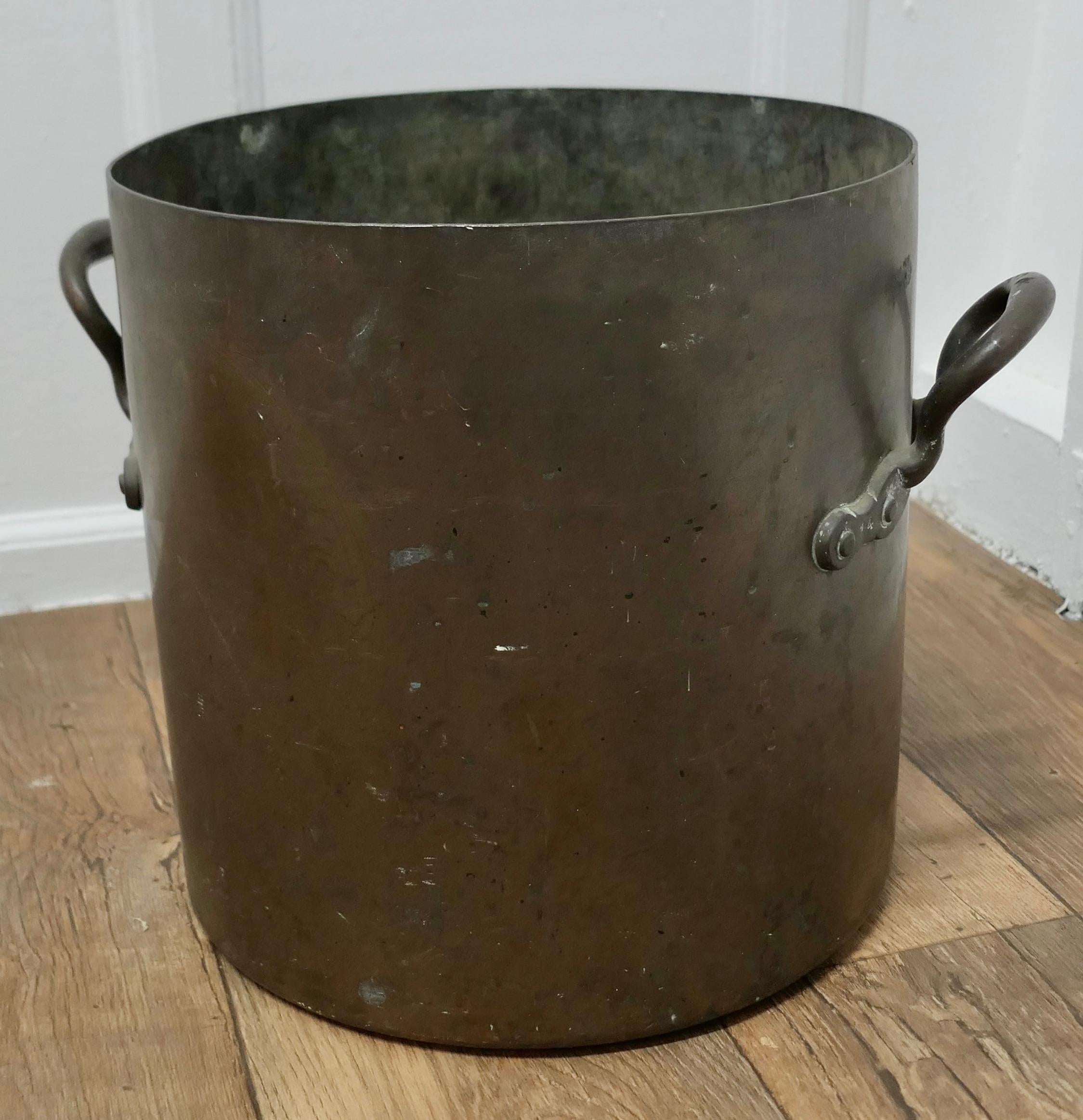 Large 19th century Tinned Copper Cooking Pot

This is a lovely looking straight sided Cooking Pot, it has L P 3 stamped on the side it has sturdy handles riveted on each side

The pot is very sound, the interior was originally tinned but is