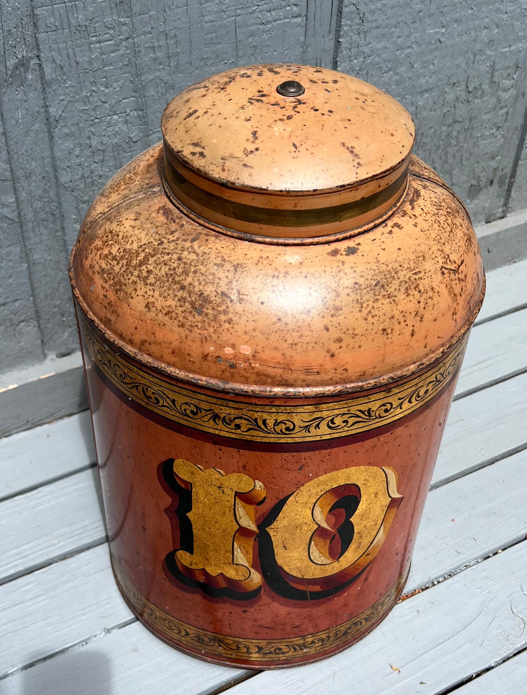 Graphically pleasing 19th century tole painted tin tea canister number 10.  The lettering and design are very well done and the paint and surface is dry and early.  