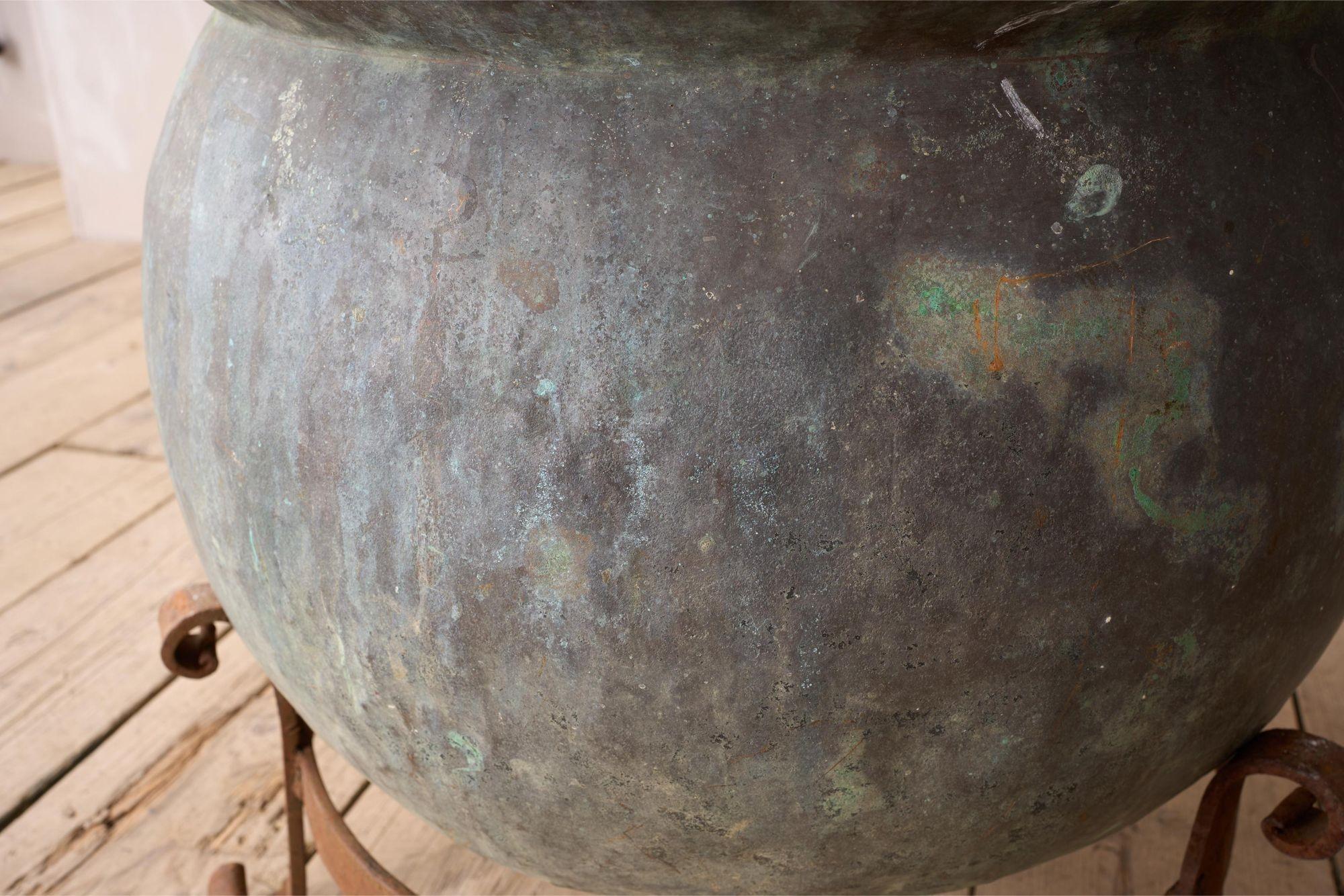 Large 19th century verdigris copper vat on iron stand 2