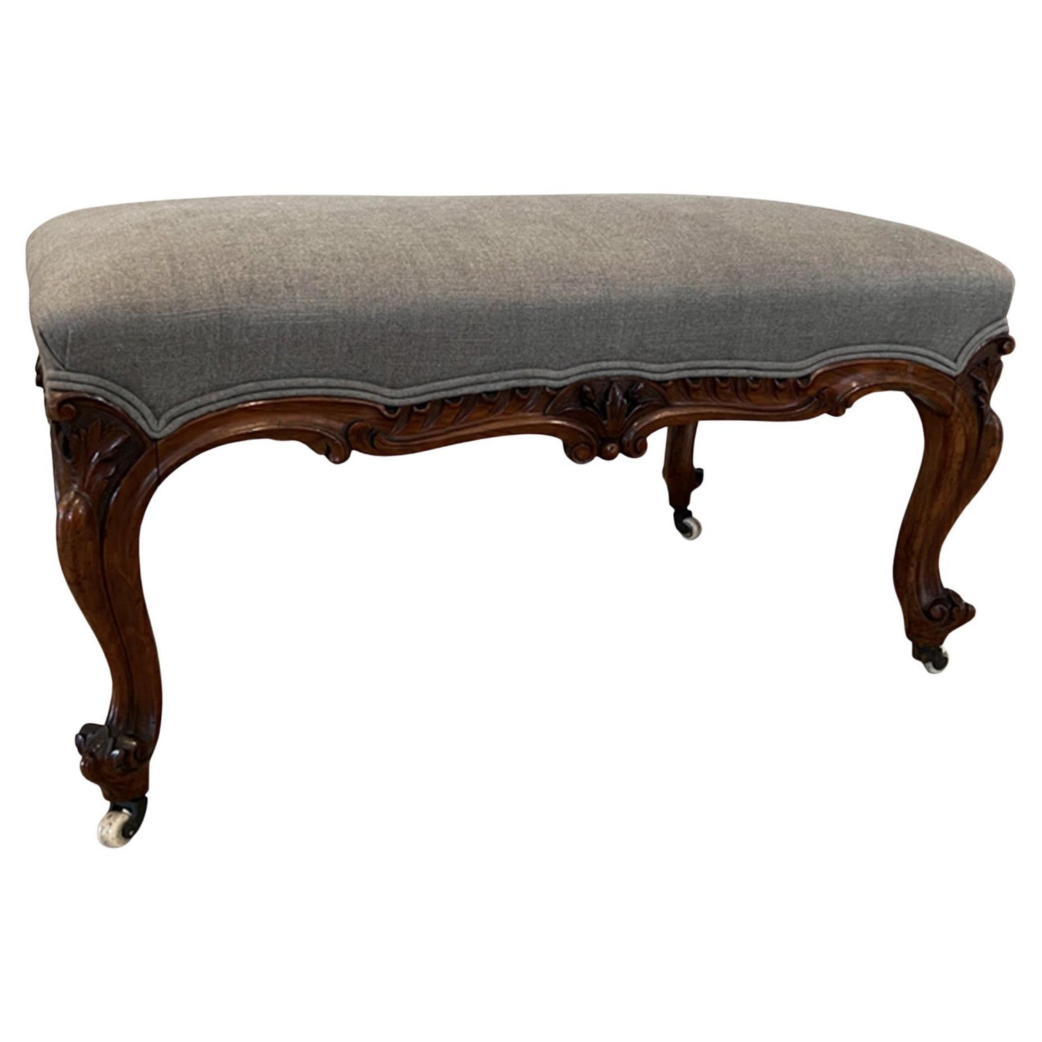 https://a.1stdibscdn.com/large-19th-century-walnut-upholstered-foot-stool-for-sale/f_64502/f_278345321647528813116/f_27834532_1647528813613_bg_processed.jpg?width=1500