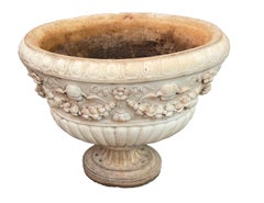 Large 19th Century White Marble Oval Urn with Cherub Motif