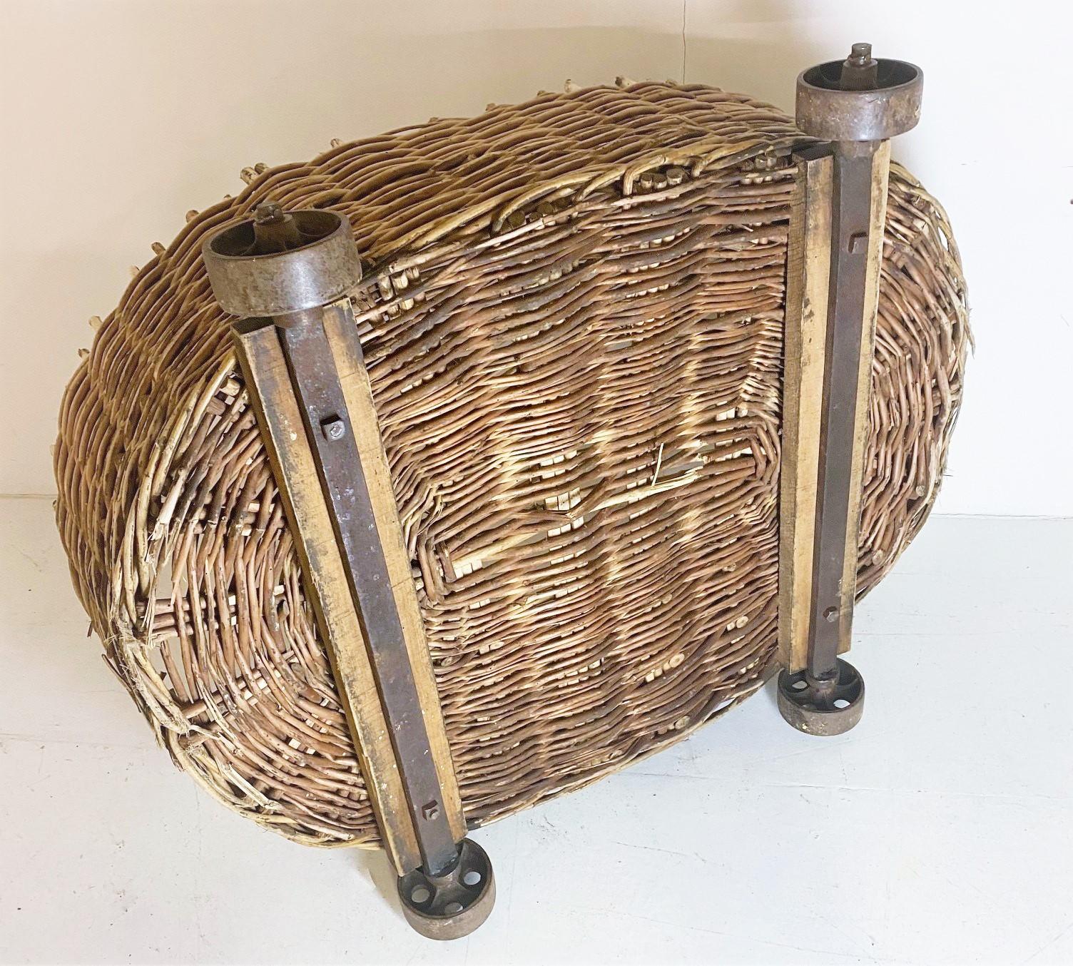 Large 19th Century Wicker Dog Bed Log Basket on Original Cast Iron Wheels For Sale 2