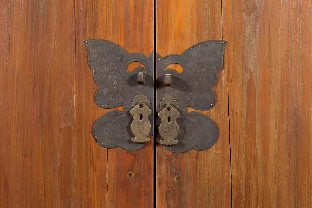 Large 19th Century Wooden Wedding Cabinet with Butterfly Hardware In Good Condition For Sale In Yonkers, NY
