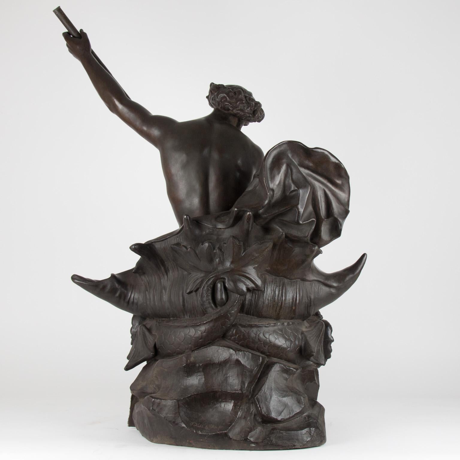 Large 19th century Zamac statue depicting Neptune sitting on two dolphins,
depicting Neptune, signed by F.Kahl &Sohn fec.1871.
The statue is made of Zamac with a beautiful bronze patina.
   
